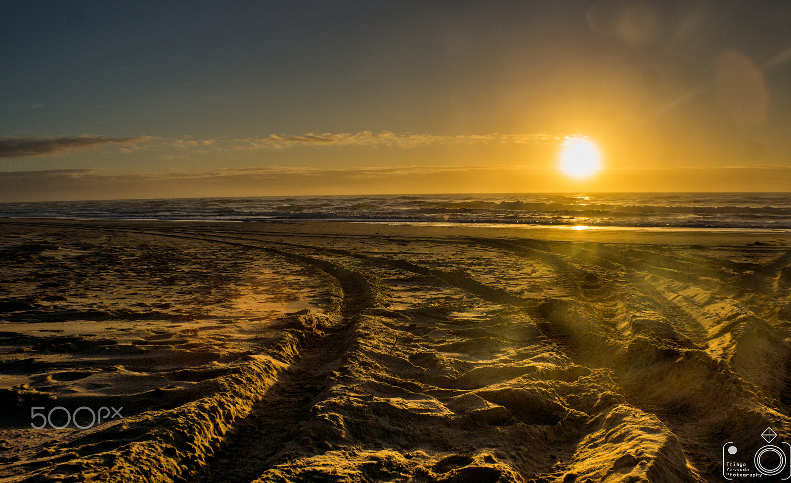 Sony SLT-A65 (SLT-A65V) sample photo. Rainbow beach tire marks photography