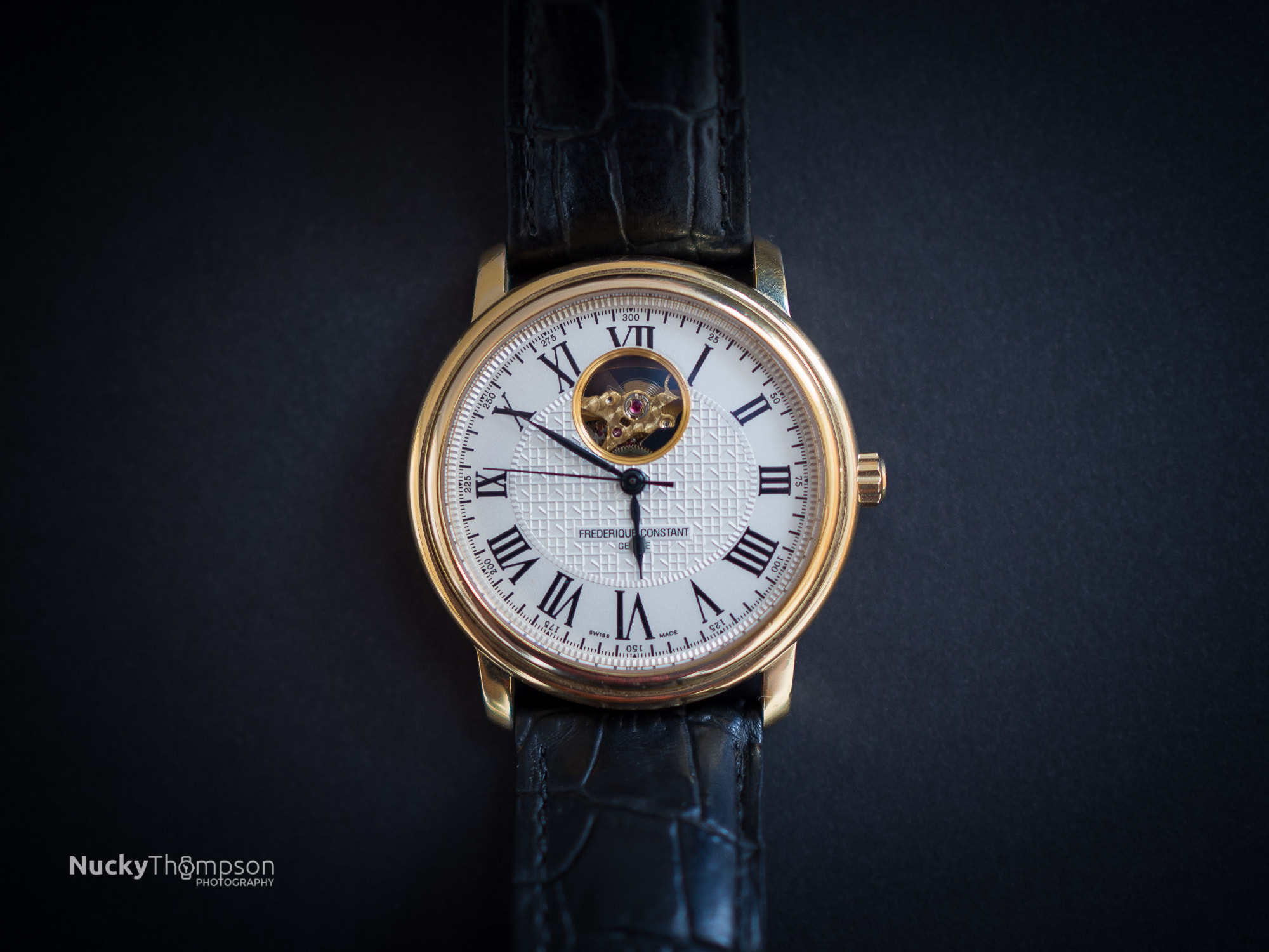 Olympus OM-D E-M10 II + Olympus M.Zuiko Digital 25mm F1.8 sample photo. Frederique constant open heart gold watch photography