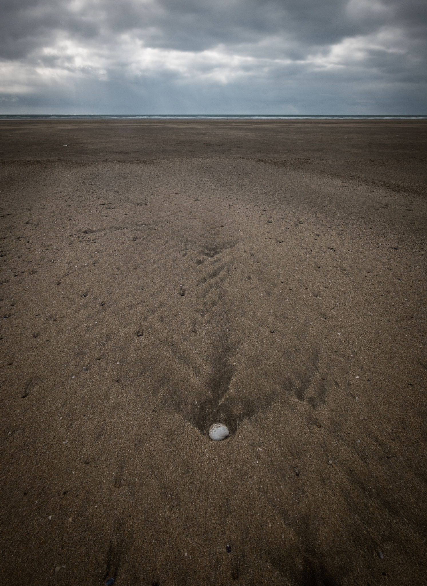 Fujifilm X-M1 + Fujifilm XF 14mm F2.8 R sample photo. Pebble, beach photography