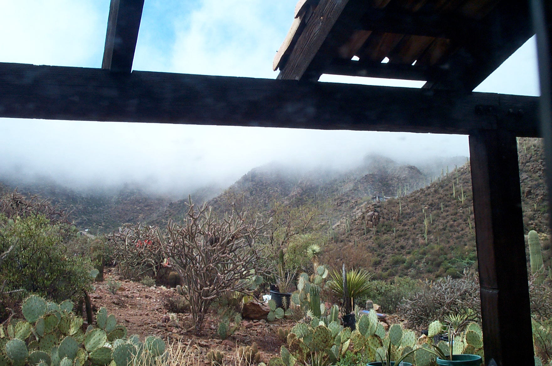 Kodak DC280 ZOOM DIGITAL CAMERA sample photo. Clouds covering mountaintops photography