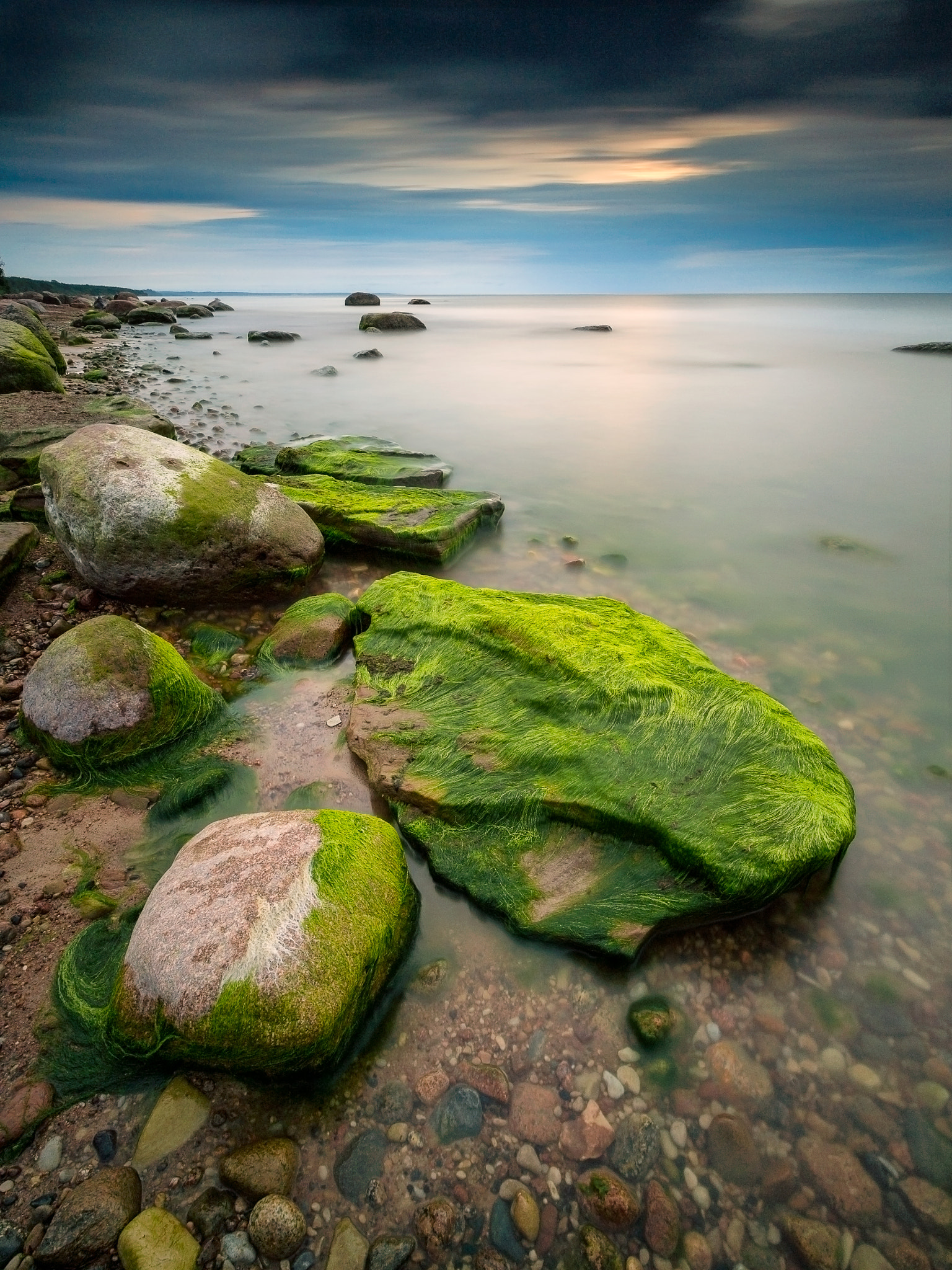 Olympus OM-D E-M5 + Olympus M.Zuiko Digital ED 7-14mm F2.8 PRO sample photo. Sunset on a rocky coast in saka, estonia photography