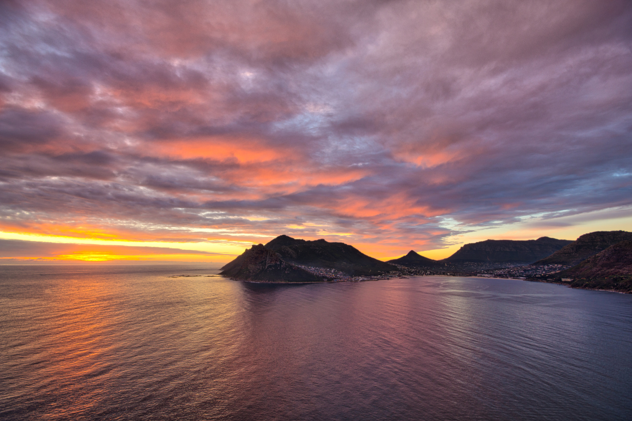 Sony SLT-A77 + Sigma AF 10-20mm F4-5.6 EX DC sample photo. A stunning sunset over hout bay, looking down from chapman's peak photography