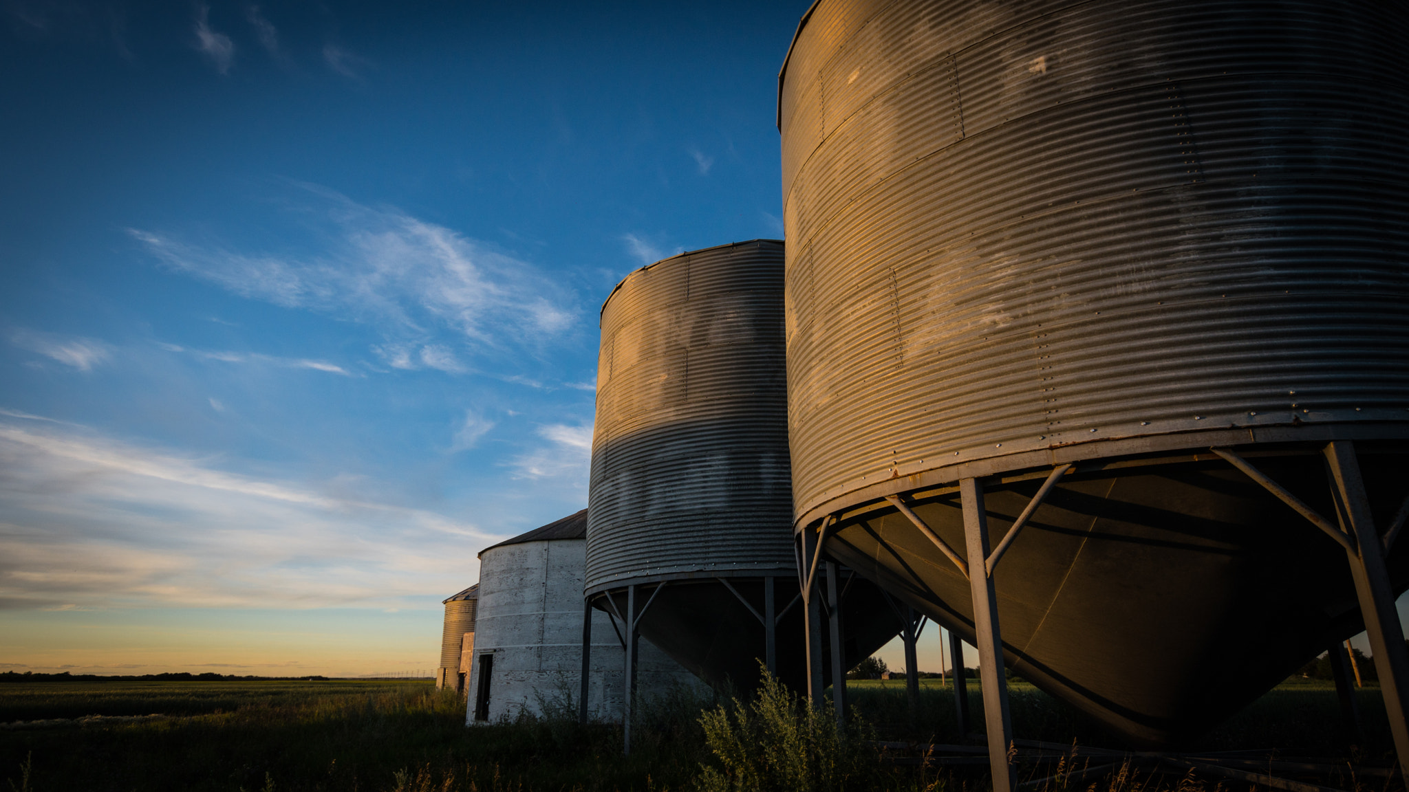 Sony a6300 + Sigma 10-20mm F3.5 EX DC HSM sample photo. Silos at sunset photography