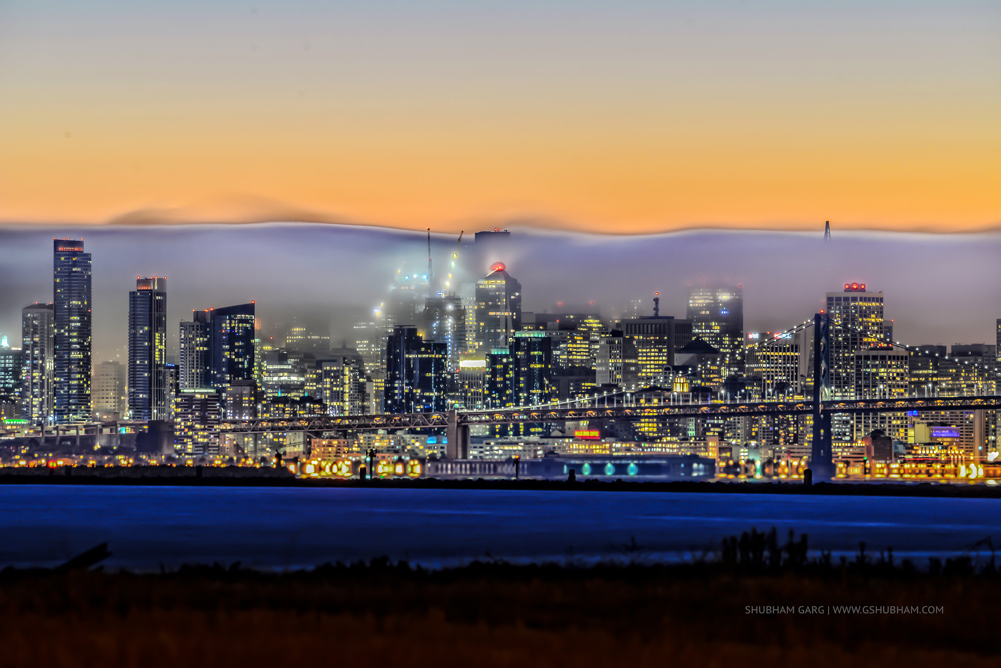 Nikon AF-S Nikkor 200-500mm F5.6E ED VR sample photo. Fog city - outside home photography