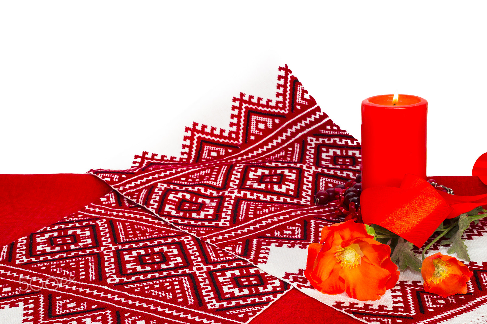Canon EOS-1D Mark IV + Canon EF 50mm F1.2L USM sample photo. Red candle, towel in russian or ukrainian-style with a national photography