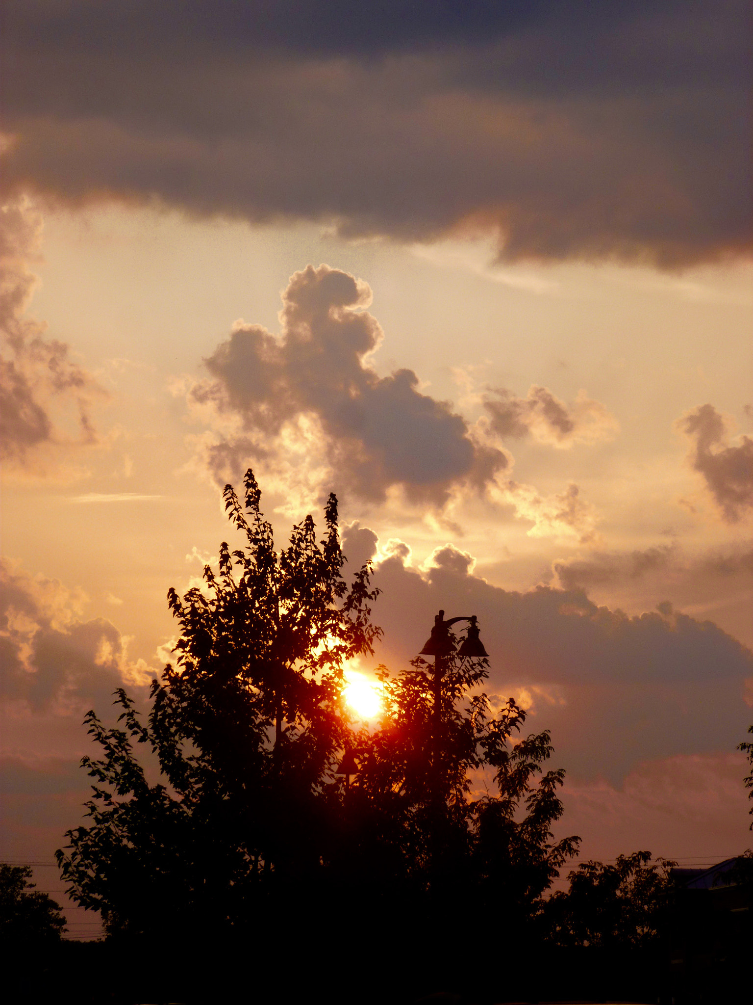 Panasonic Lumix DMC-ZS8 (Lumix DMC-TZ18) sample photo. Sunset of the bells photography