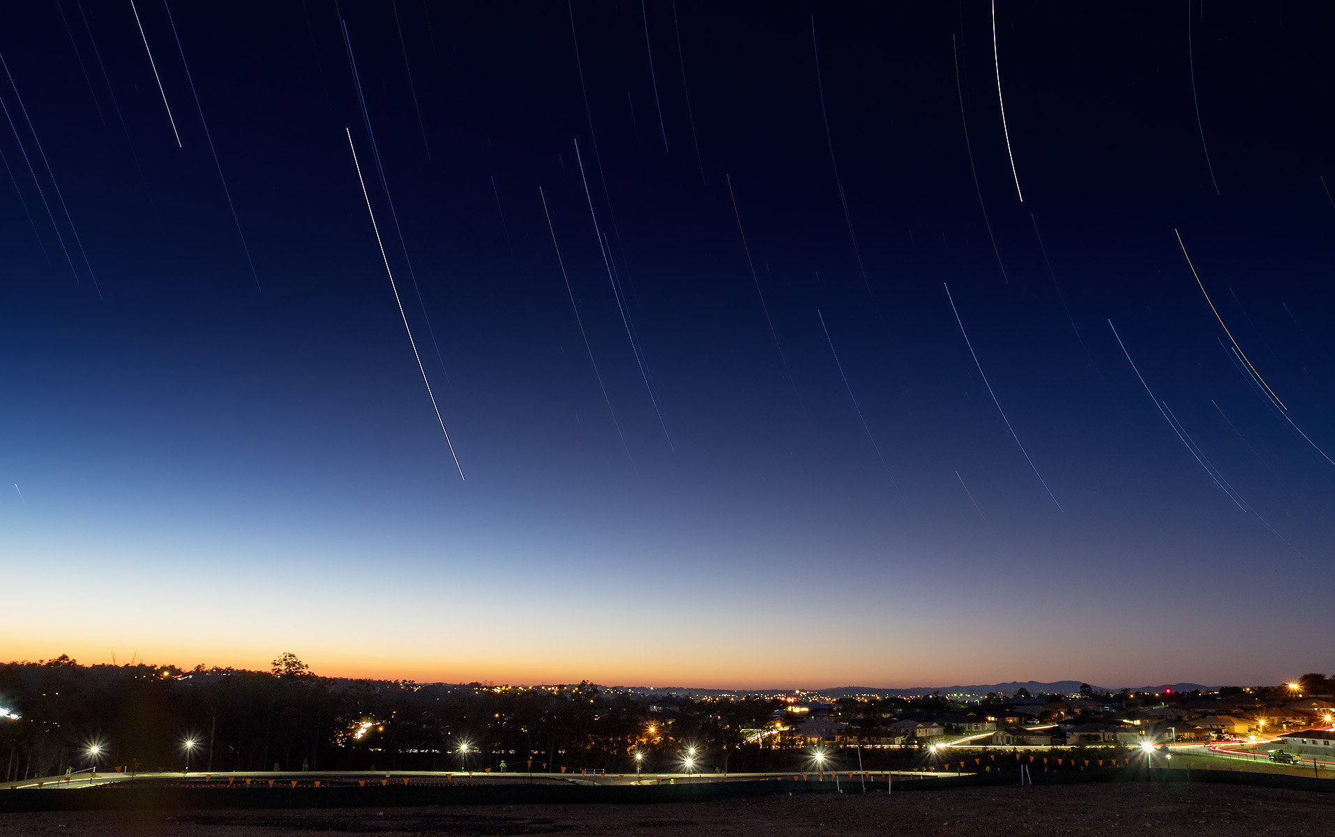 Olympus Zuiko Digital ED 12-60mm F2.8-4.0 SWD sample photo. Early morning exposure to capture both the star trails and the first light of the rising sun. photography