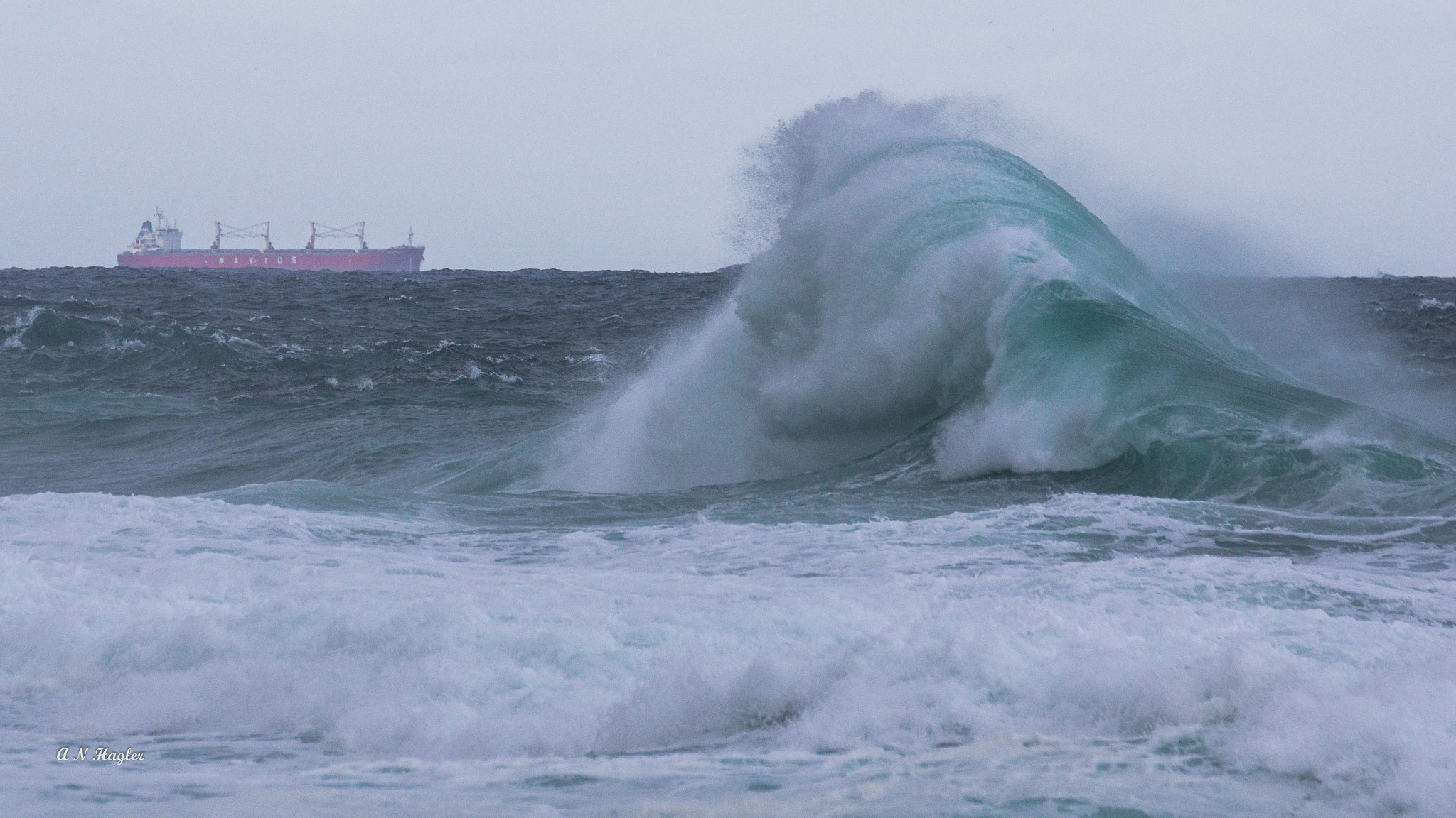 Sony 70-300mm F4.5-5.6 G SSM sample photo. Ship and big breaking wave photography