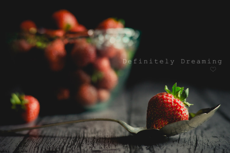 Sony a99 II + Sony 85mm F2.8 SAM sample photo. Strawberry on a spoon with out of focus bowl photography