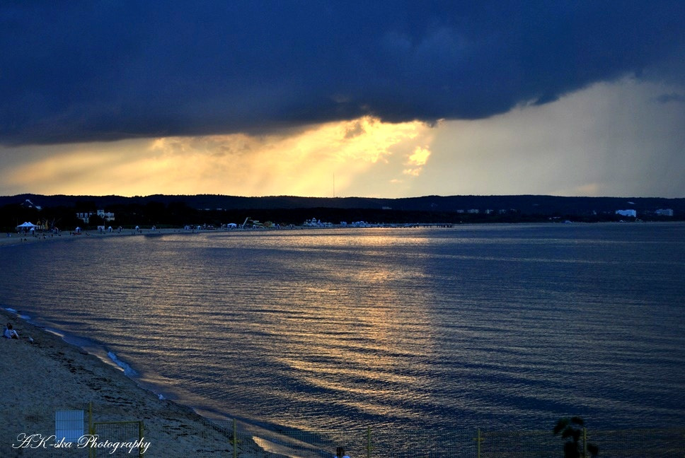 Nikon D3000 sample photo. Storm-clouds and sunset photography