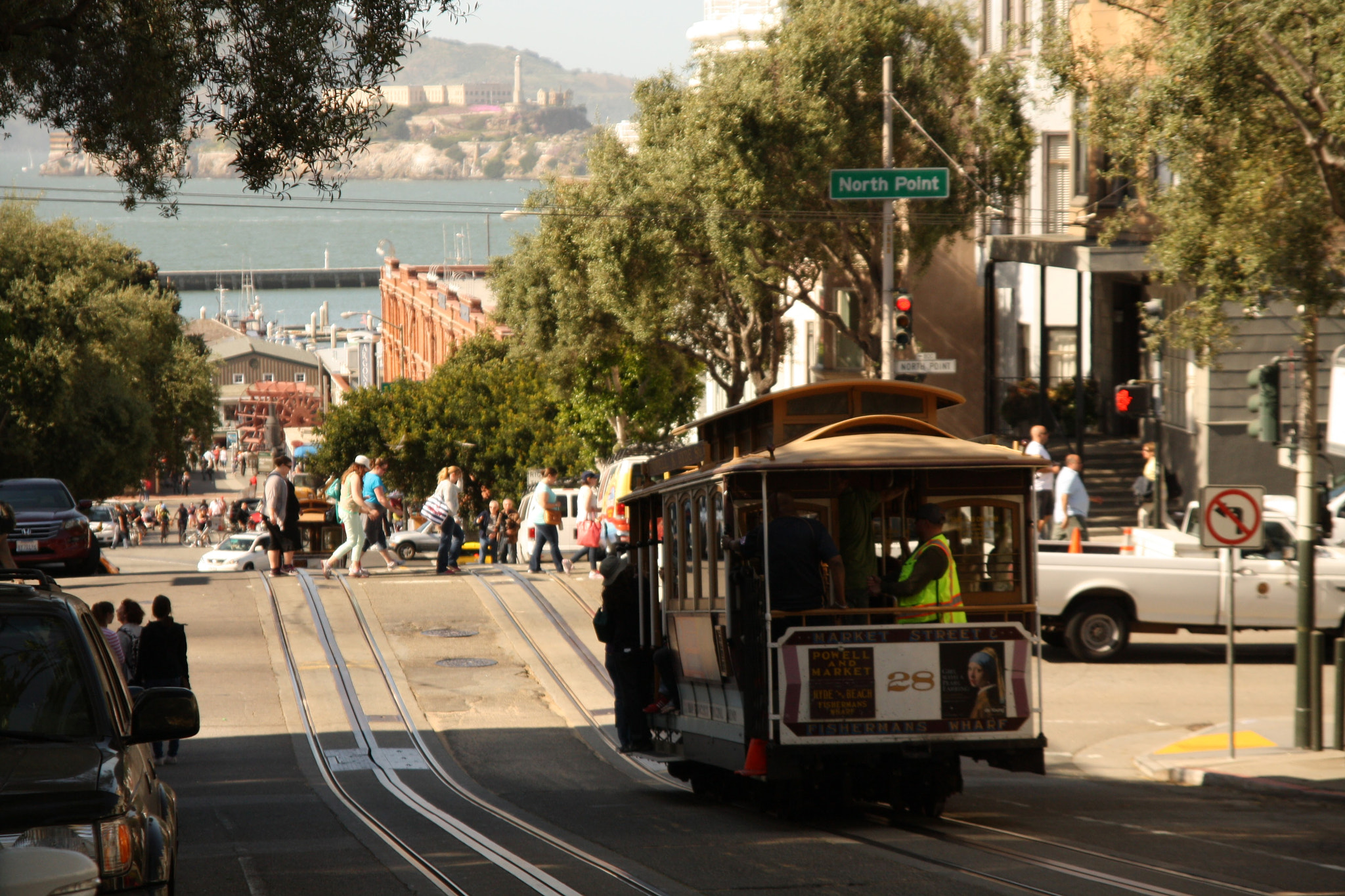 Sigma 17-70mm F2.8-4 DC Macro OS HSM sample photo. San francisco, streetcar, street and alcatraz in the background photography