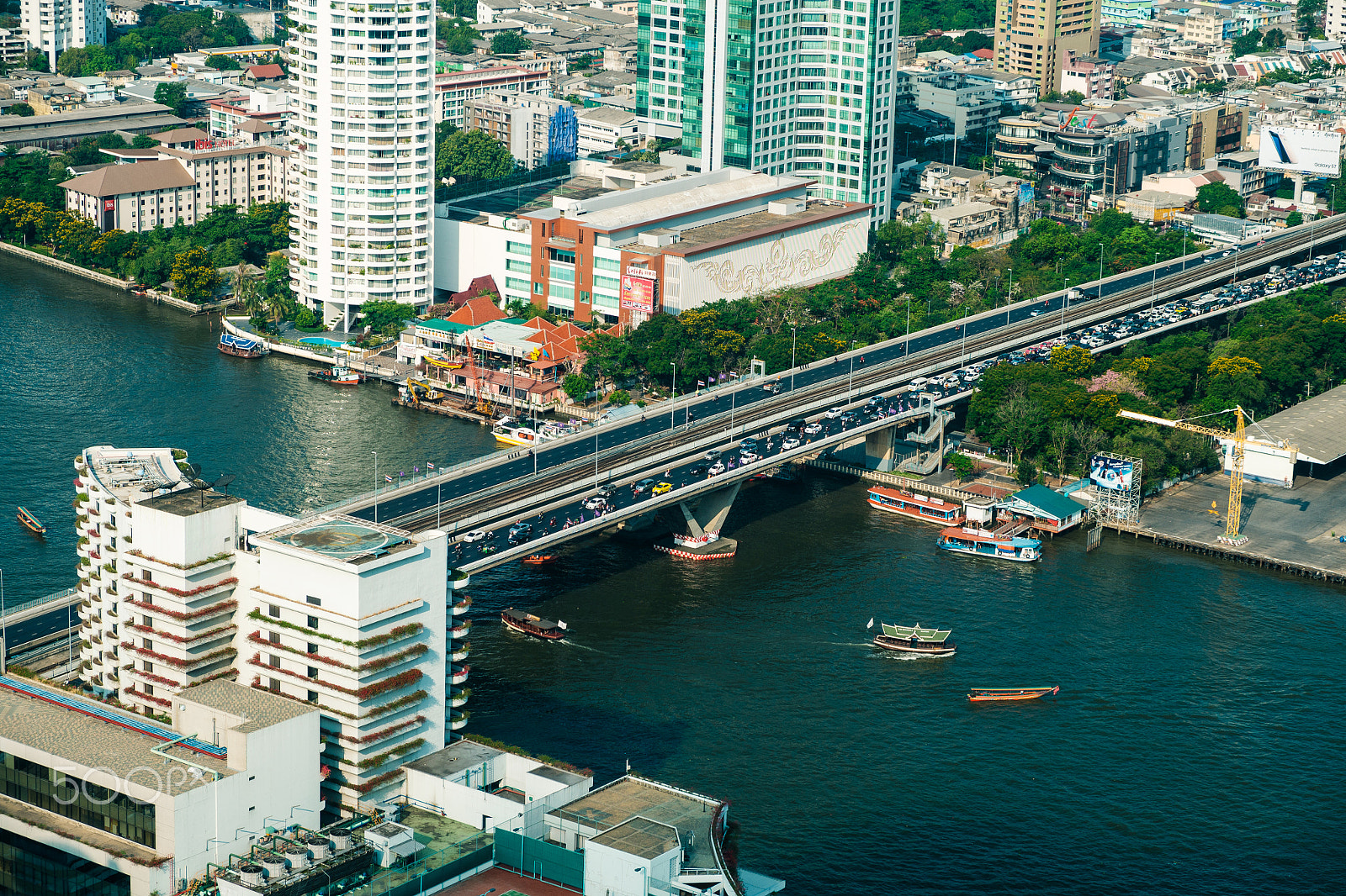 Fujifilm X-A2 + Fujifilm XF 18-55mm F2.8-4 R LM OIS sample photo. King taksin bridge at chao phraya river photography