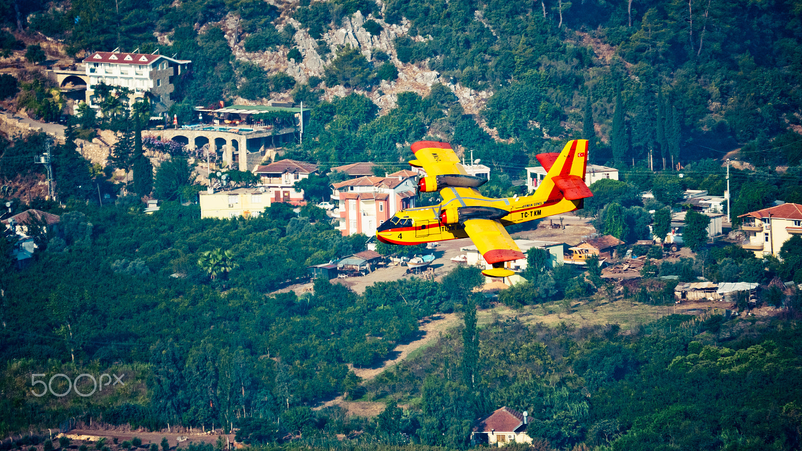 Panasonic Lumix DMC-GH4 sample photo. Aircraft firefighter take water in the sea photography