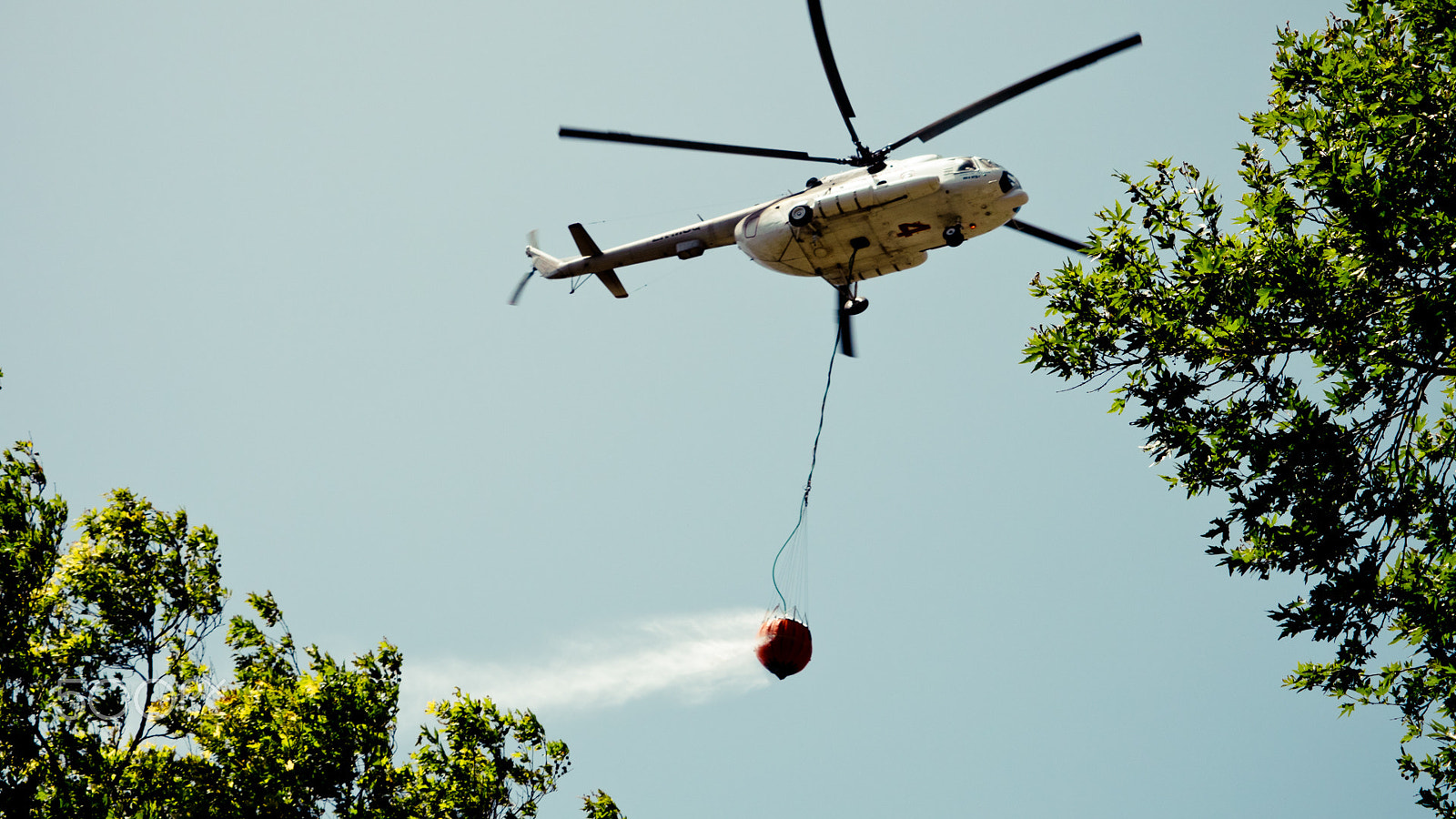 Panasonic Lumix DMC-GH4 sample photo. Aircraft firefighter take water in the sea photography