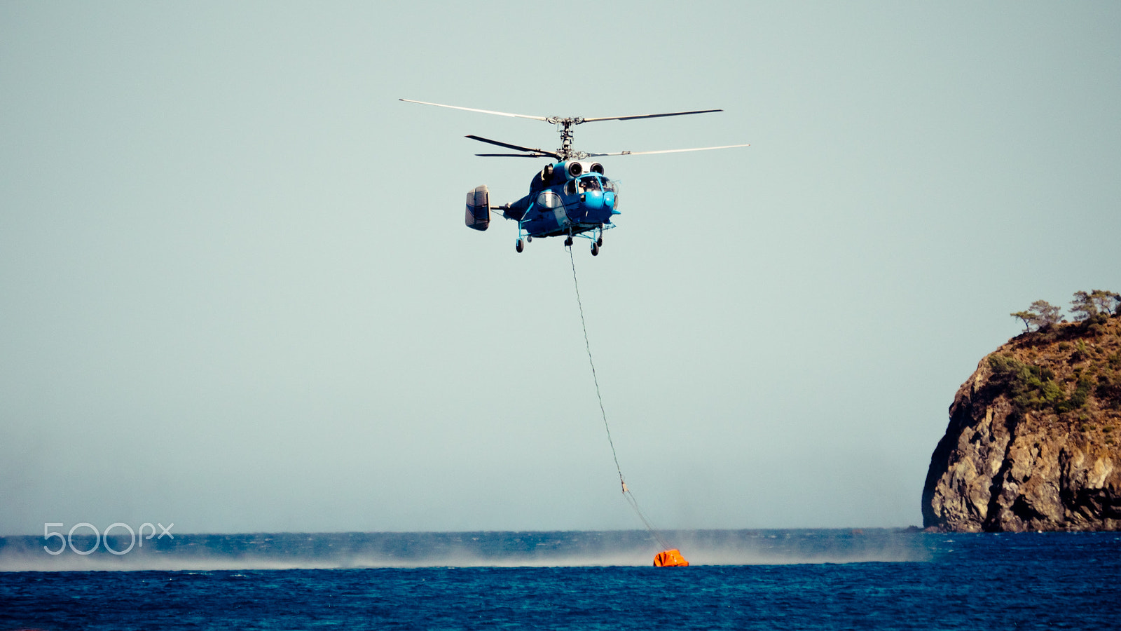 Panasonic Lumix DMC-GH4 sample photo. Aircraft firefighter take water in the sea photography