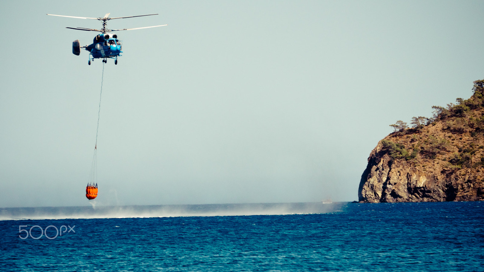 Panasonic Lumix DMC-GH4 sample photo. Aircraft firefighter take water in the sea photography