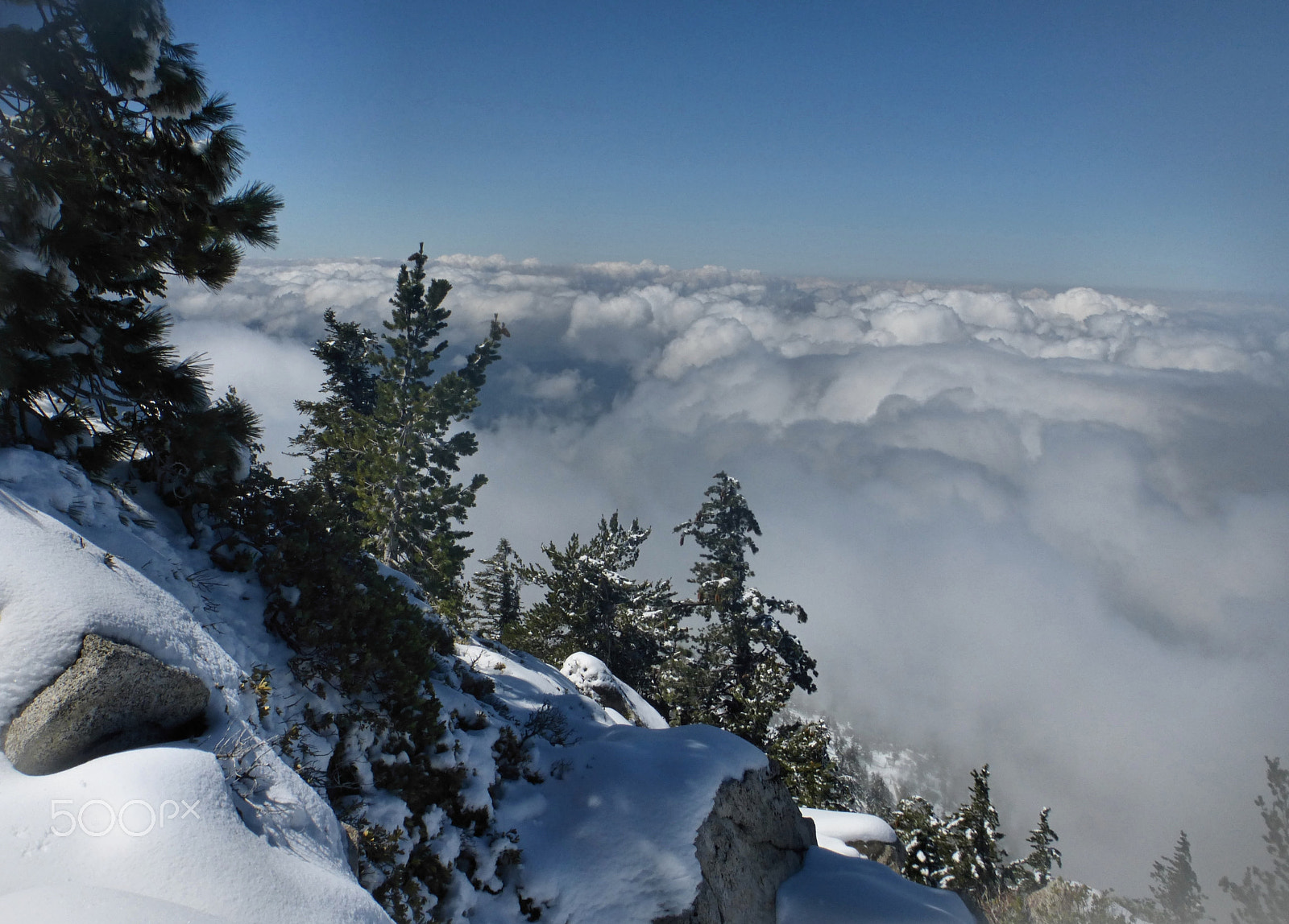 Panasonic Lumix DMC-ZS25 (Lumix DMC-TZ35) sample photo. Above a snow storm in the mountains photography