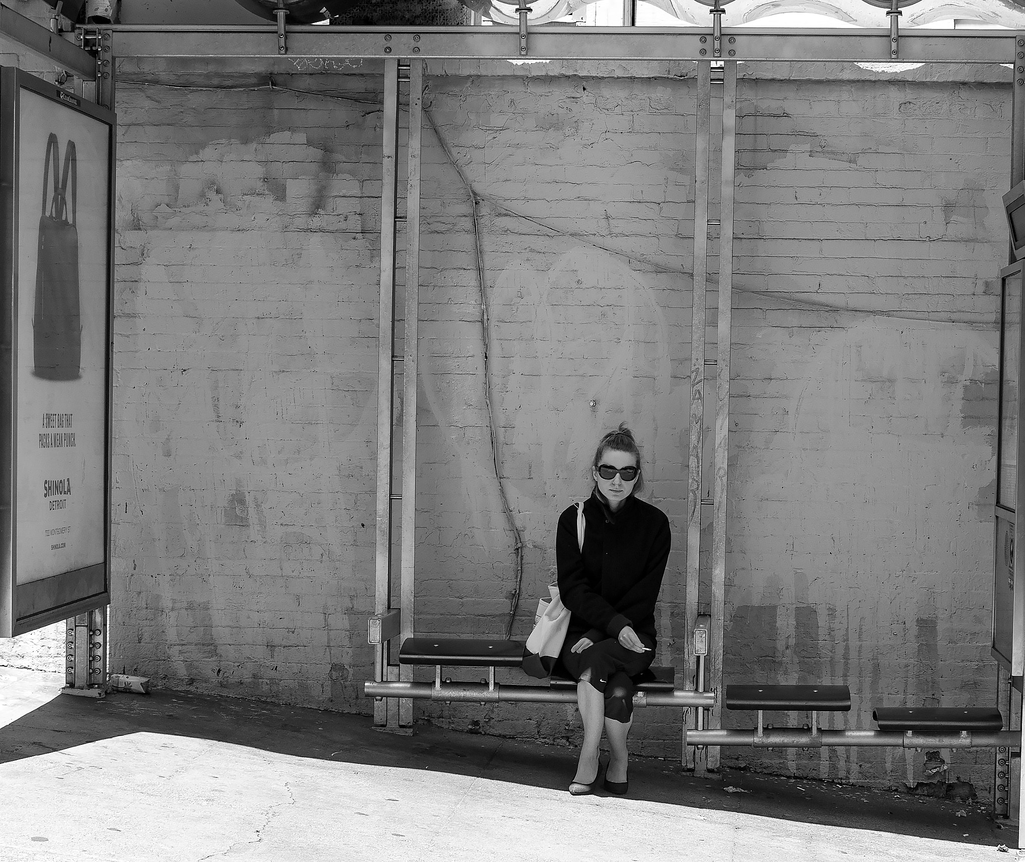 Leica M-Monochrom sample photo. Bus stop with cigarette photography