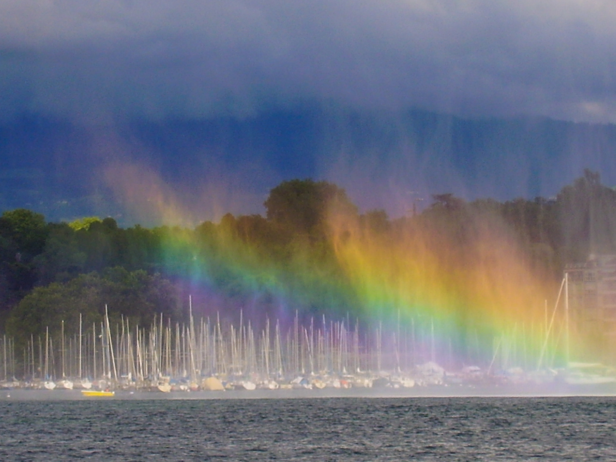 Olympus FE115,X715 sample photo. Geneva: jet d'eau with rainbow effects photography