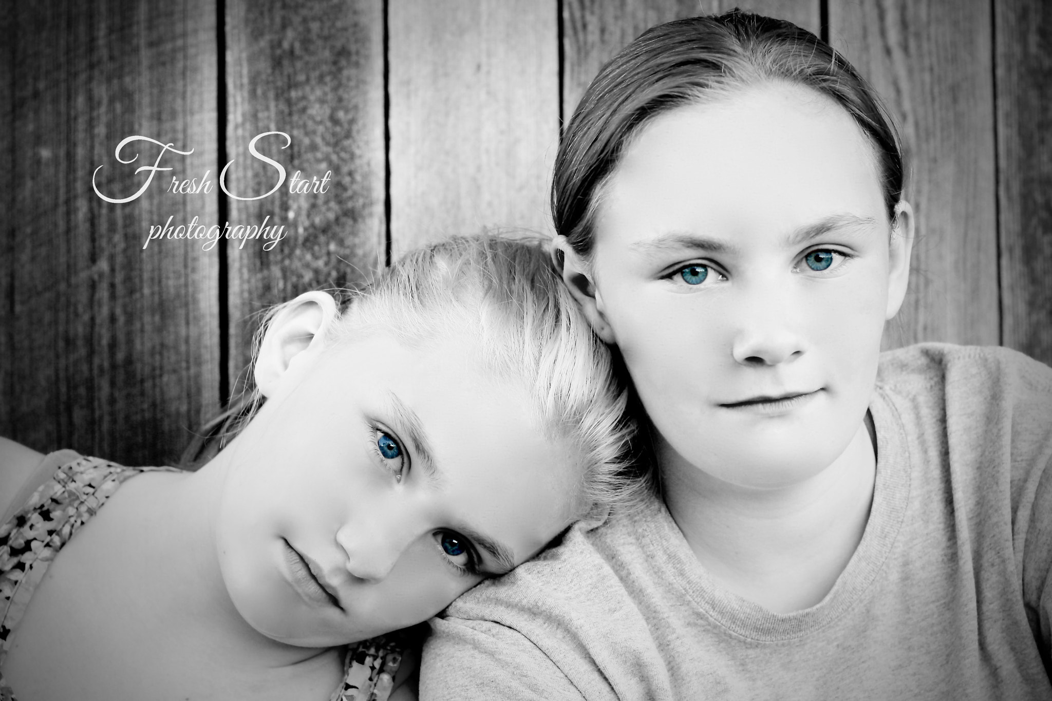 Canon EOS 1000D (EOS Digital Rebel XS / EOS Kiss F) sample photo. Sisters through and through...blue eyes black and white photography