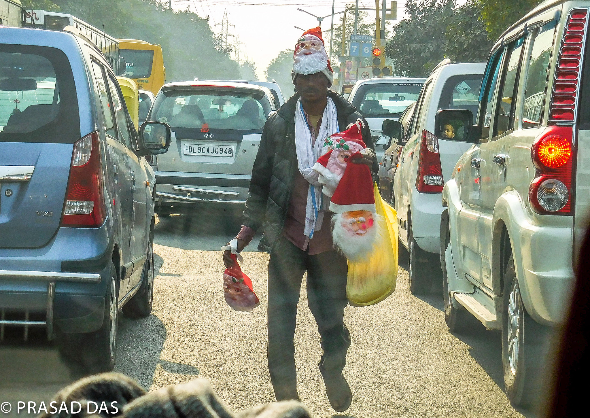 Nikon Coolpix S6900 sample photo. Highway "street vendor" hawking christmas goodies (of ) photography