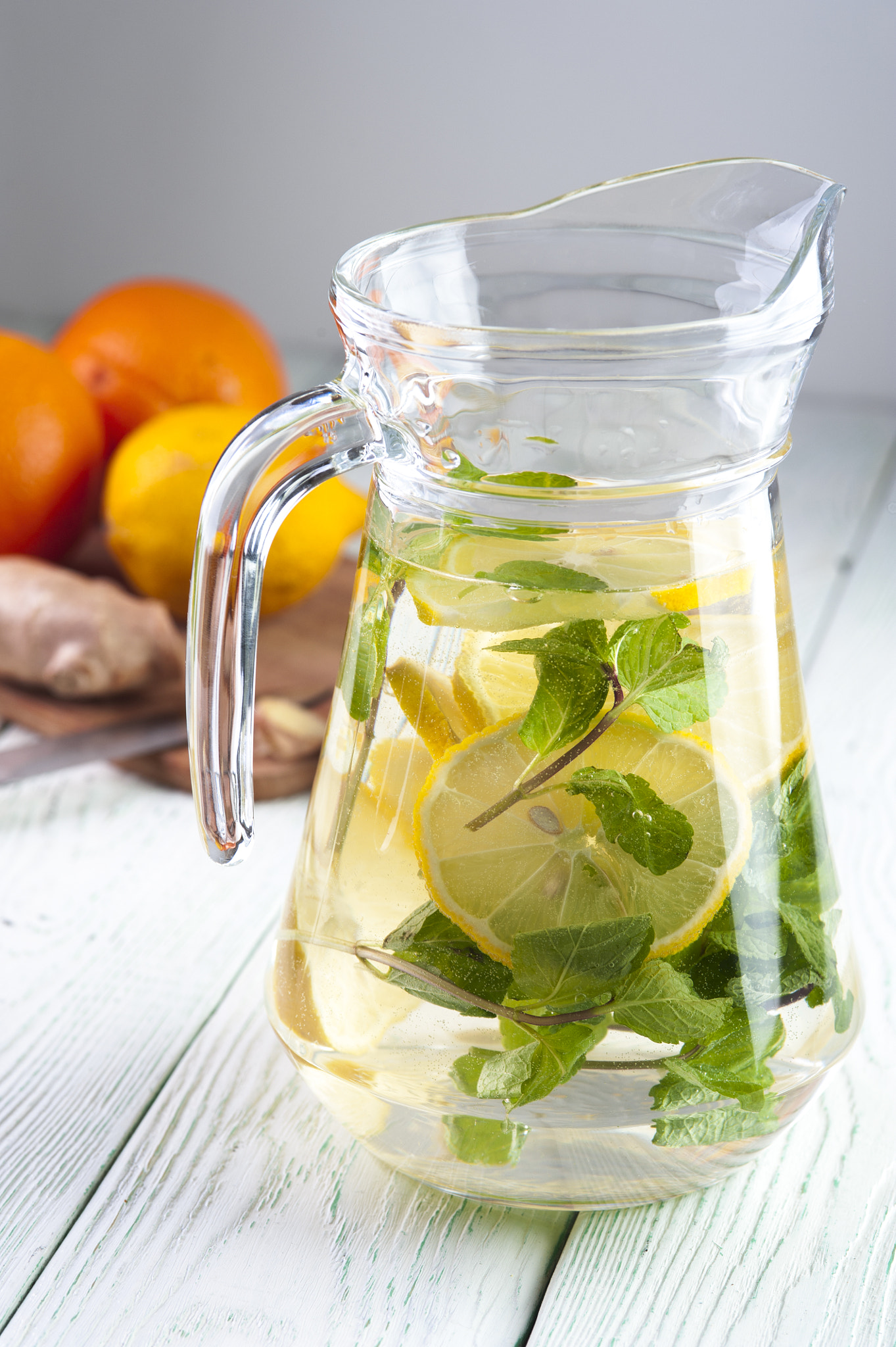 Nikon D700 + AF Micro-Nikkor 105mm f/2.8 sample photo. Detox water with lemon and mint in glass jug photography