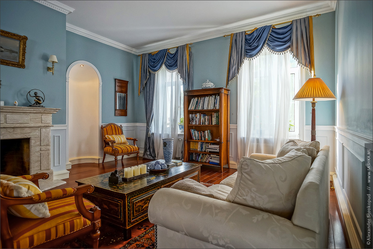 Beautiful living room interior with high windows