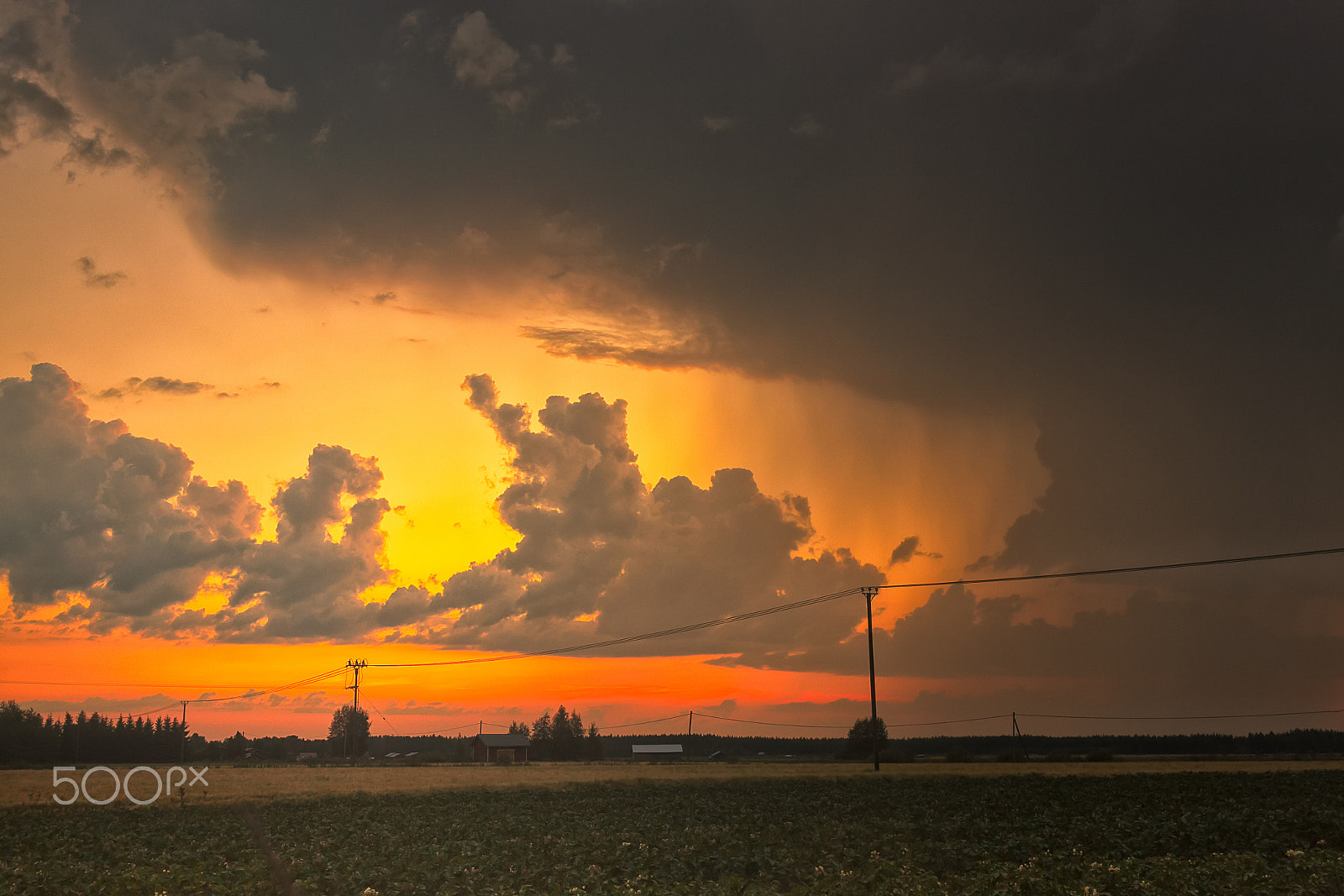 Canon EF-S 24mm F2.8 STM sample photo. Heavy rain makes way to the sunset photography