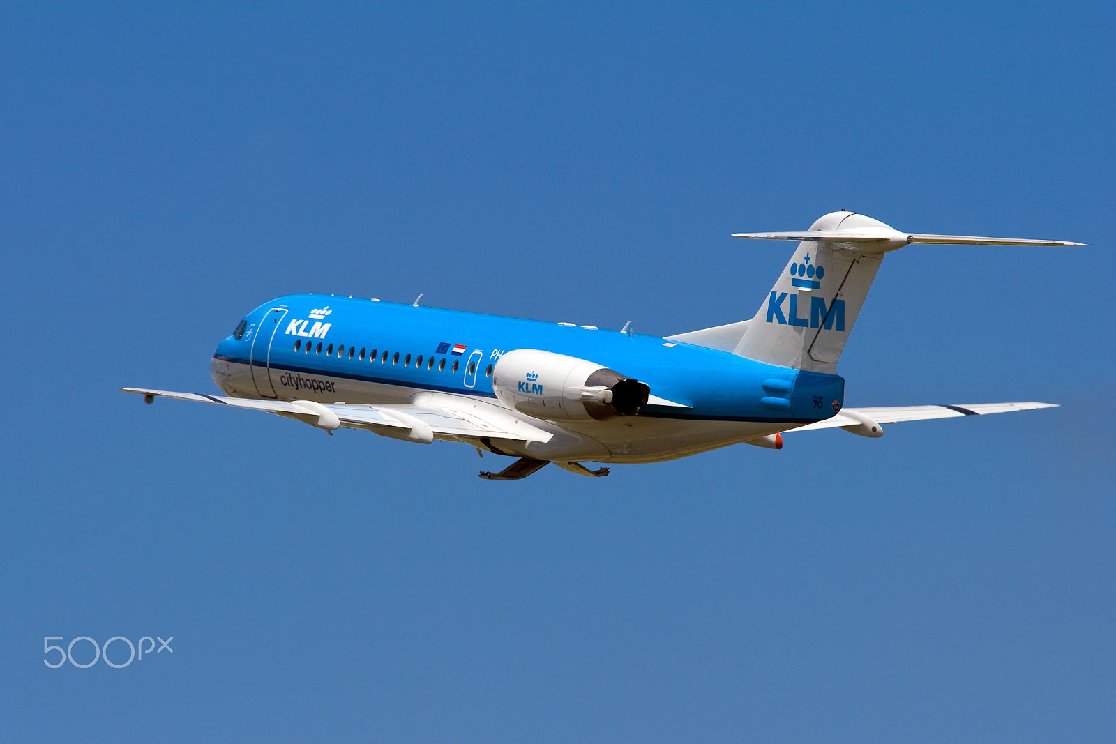 Canon EOS 400D (EOS Digital Rebel XTi / EOS Kiss Digital X) + Canon EF 70-200mm F4L USM sample photo. Klm fokker 70 climbing out of schiphol photography