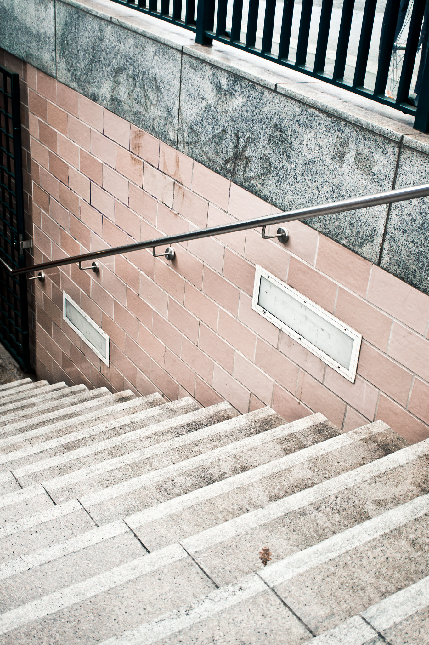 Sony Alpha NEX-5 + Sony E 30mm F3.5 Macro sample photo. Subway stairs photography