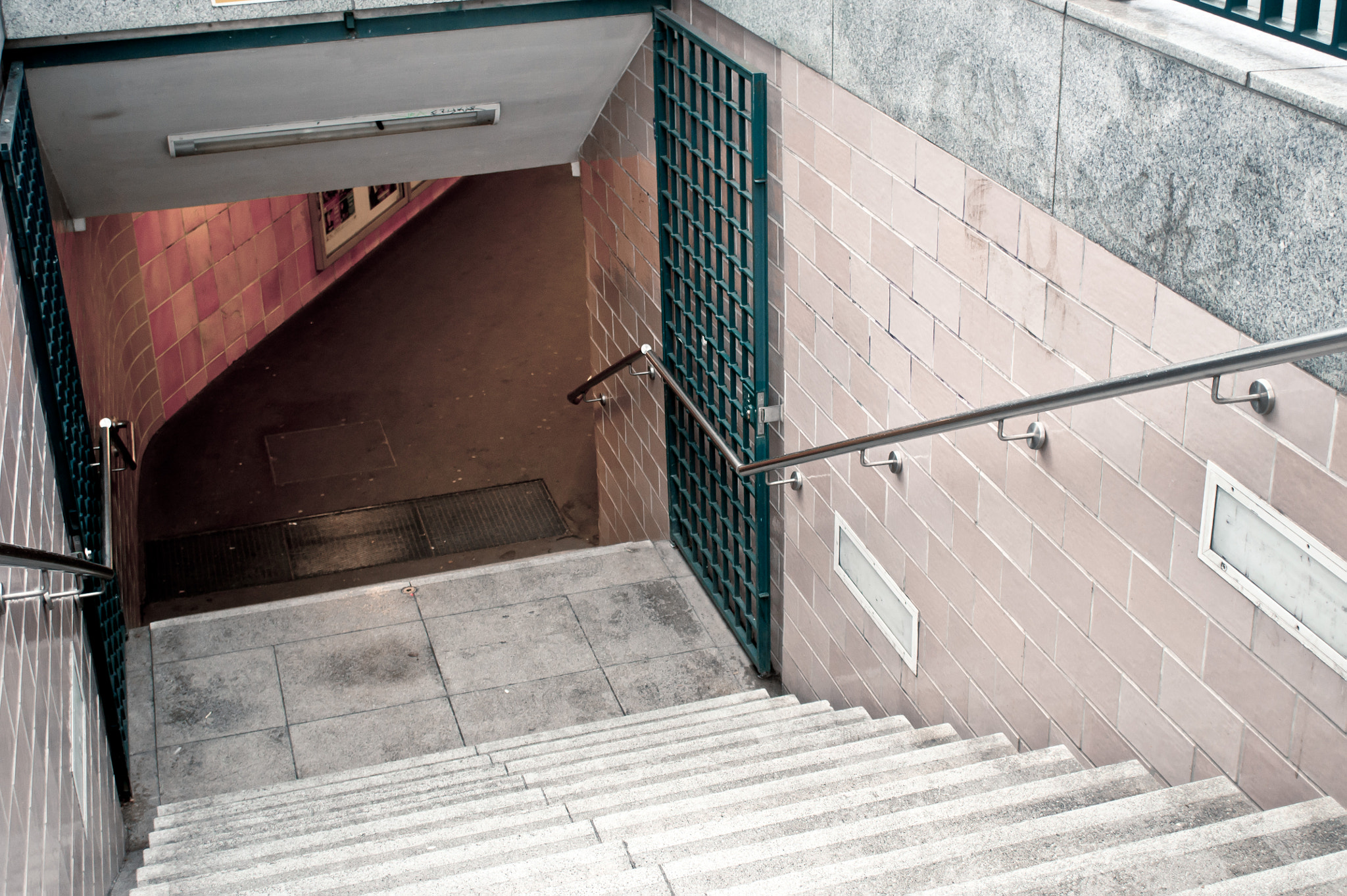 Sony Alpha NEX-5 + Sony E 30mm F3.5 Macro sample photo. Subway stairs photography