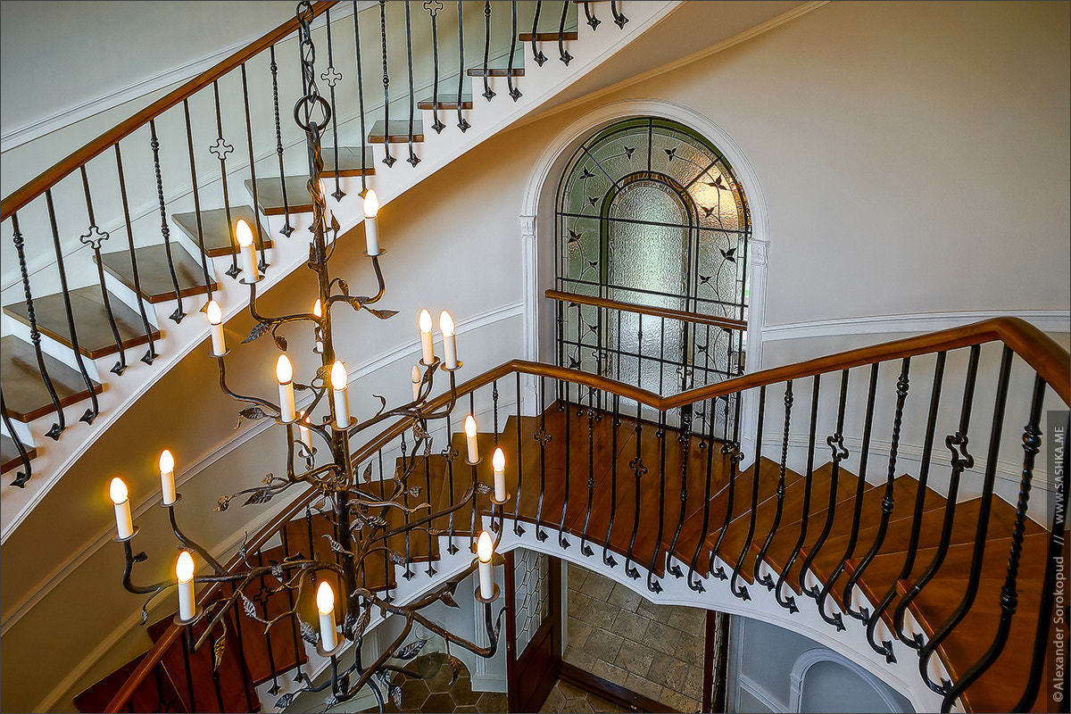 Old spiral staircase in classic russian manor style