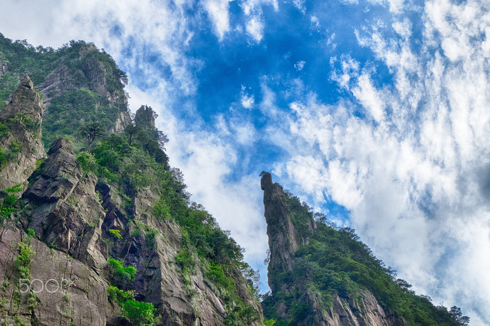 Fujifilm XC 16-50mm F3.5-5.6 OIS sample photo. Mountain stone with blue sky photography