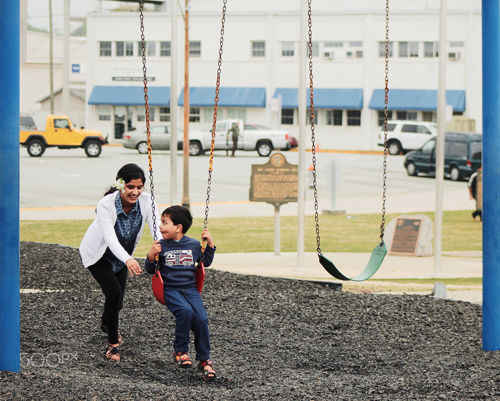 Canon EF75-300mm f/4-5.6 sample photo. Playful kid and mom in park on weekend photography