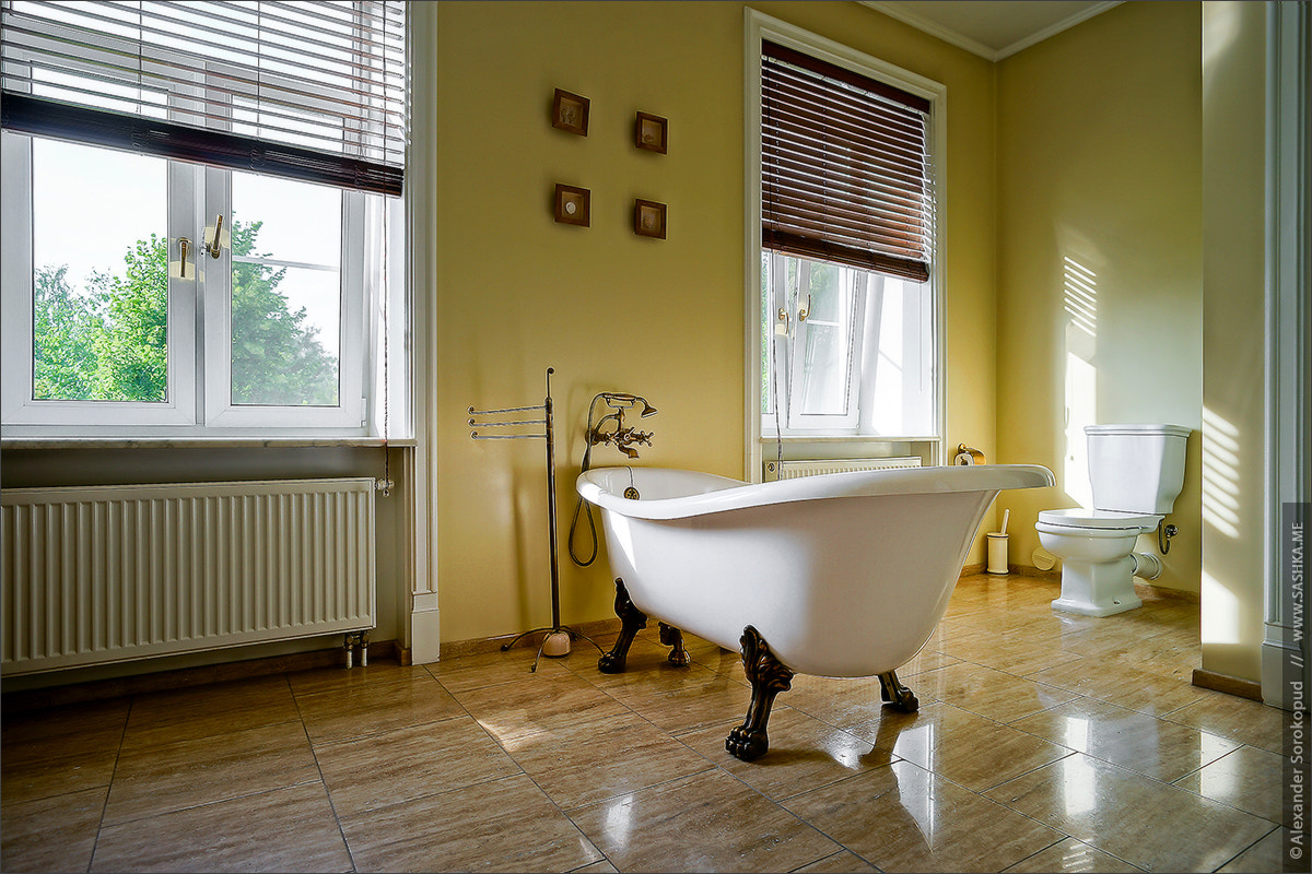 Renovated old-styled bathroom with beautiful retro bath