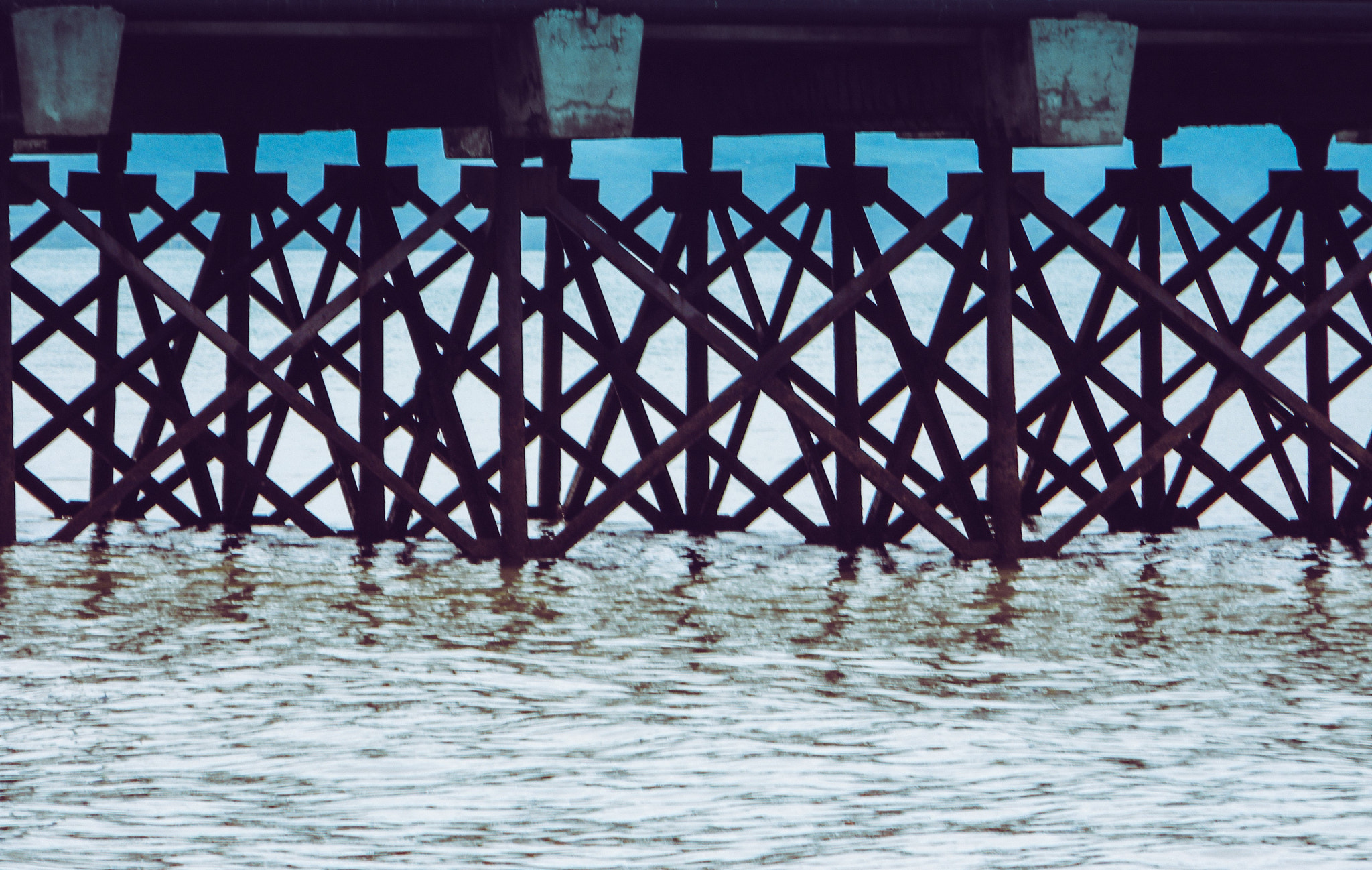 Nikon COOLPIX L105 sample photo. Beach pier patterns photography