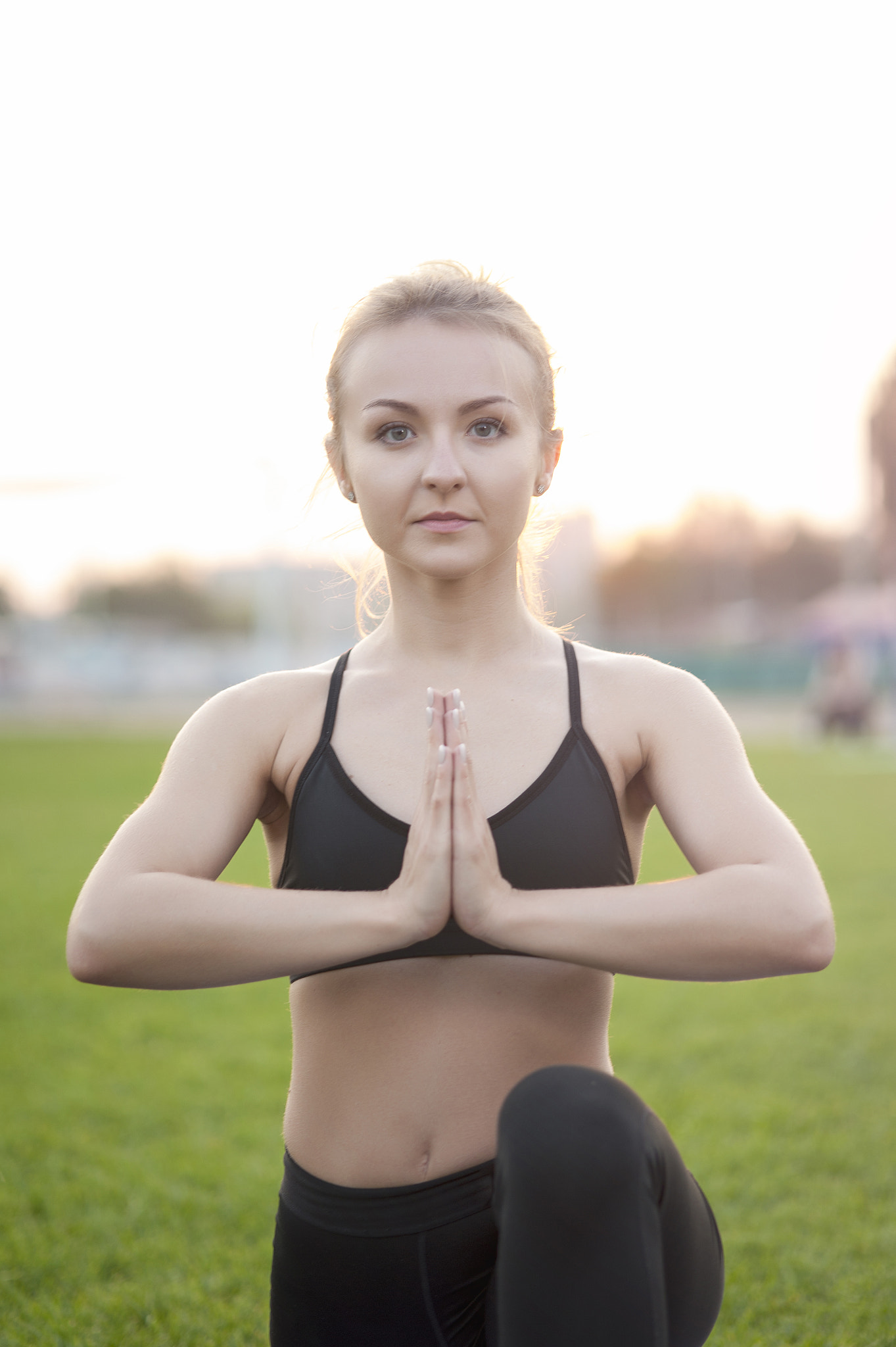 Nikon D700 + AF Micro-Nikkor 105mm f/2.8 sample photo. Beautiful blonde woman practicing yoga outdoors. holding hands i photography