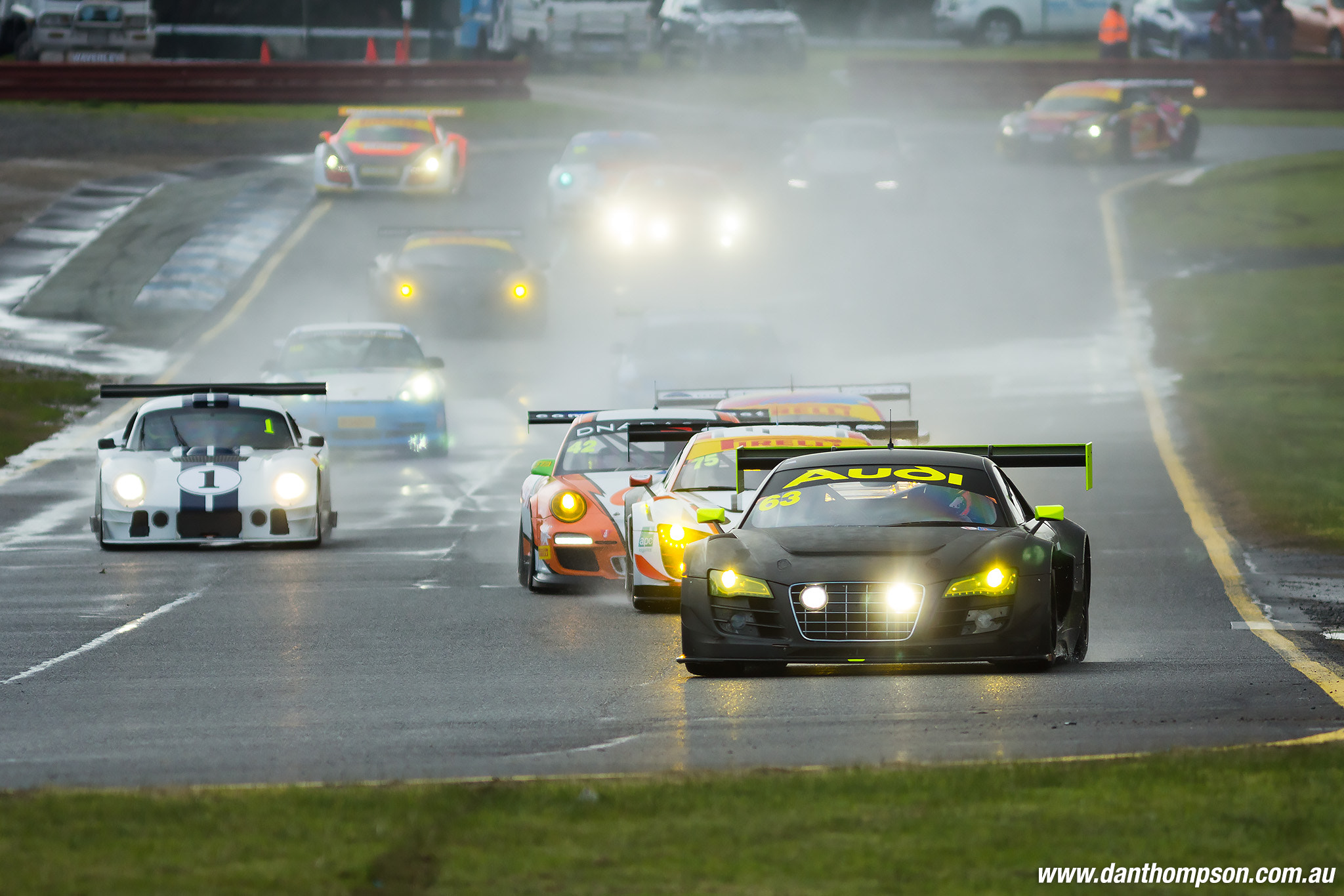 Canon EOS 60D + Canon EF 300mm F4L IS USM sample photo. Sports cars in the rain photography