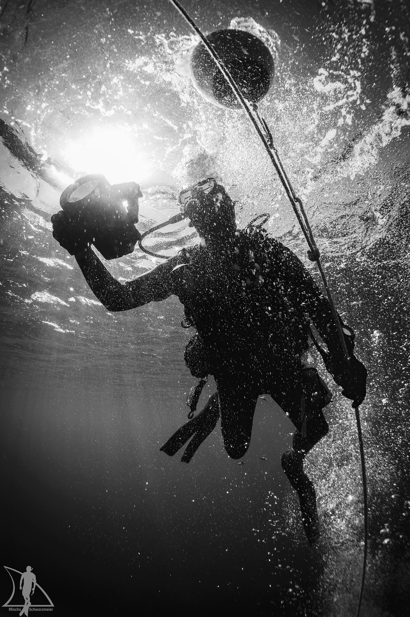 Sony Alpha NEX-5N + Sony E 16mm F2.8 sample photo. Diver in black and white.jpg photography