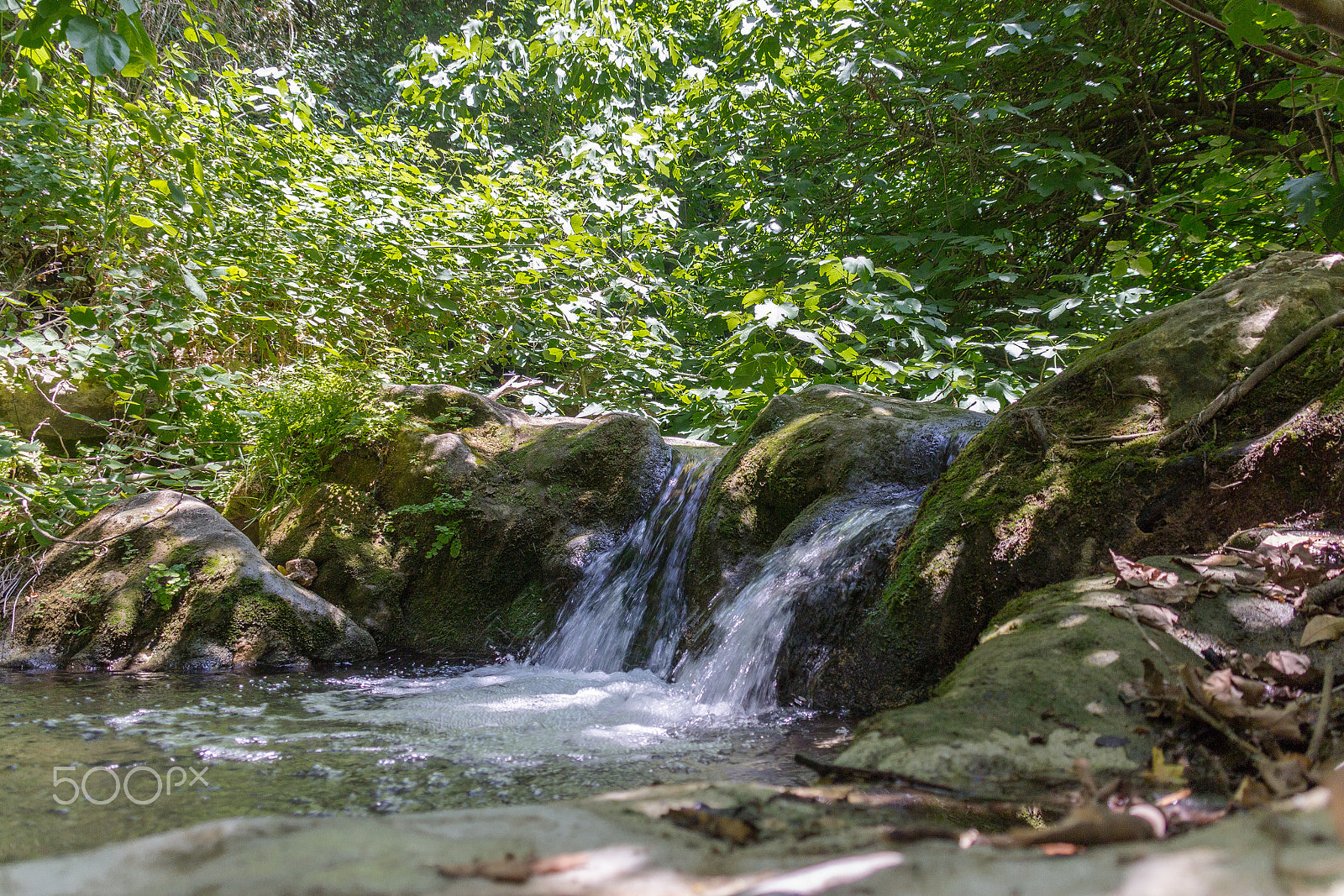 Canon EOS 600D (Rebel EOS T3i / EOS Kiss X5) + Canon EF 75-300mm F4.0-5.6 IS USM sample photo. Small waterfall in a forest stream photography