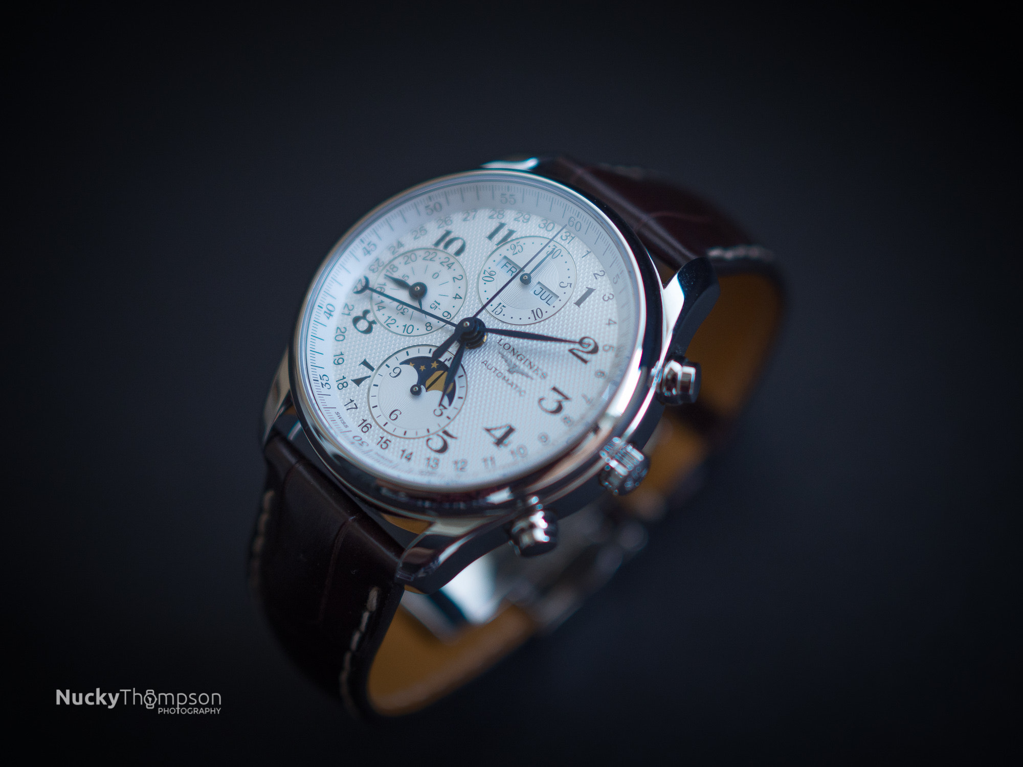 Olympus M.Zuiko Digital 25mm F1.8 sample photo. Longines master collection moonphase chronograph photography