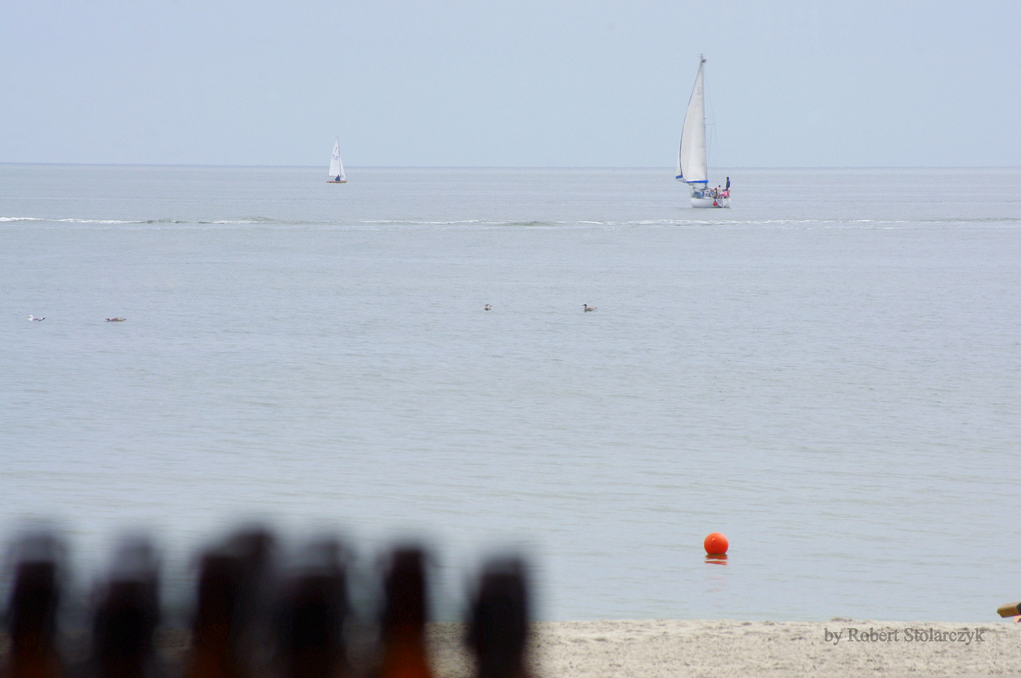 smc PENTAX-DA L 50-200mm F4-5.6 ED sample photo. Calm and cloudy day at the seaside photography