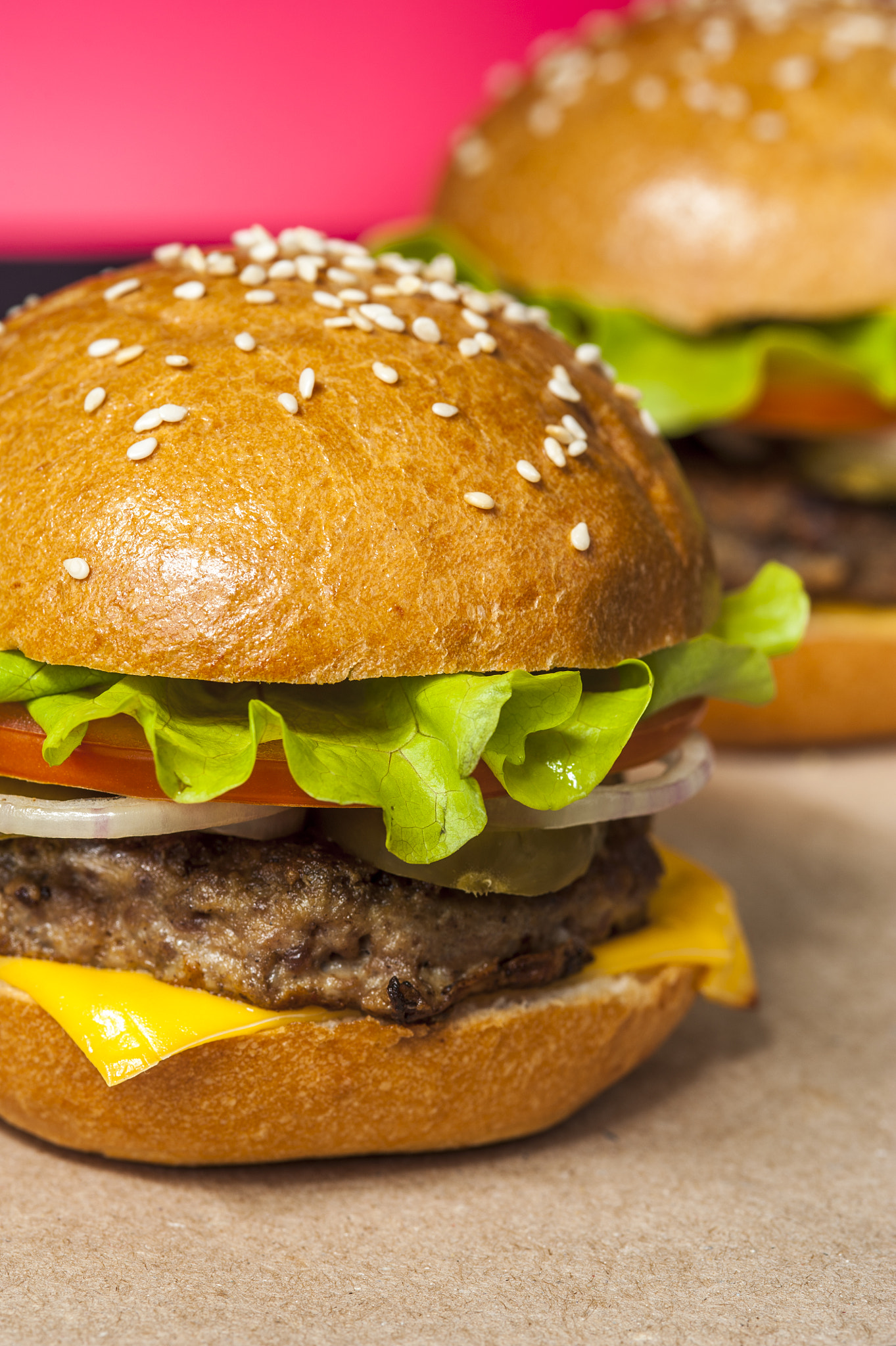 AF Micro-Nikkor 105mm f/2.8 sample photo. Two appetizing hamburgers with vegetables on wooden table. fast food, junk food. unhealthy food... photography