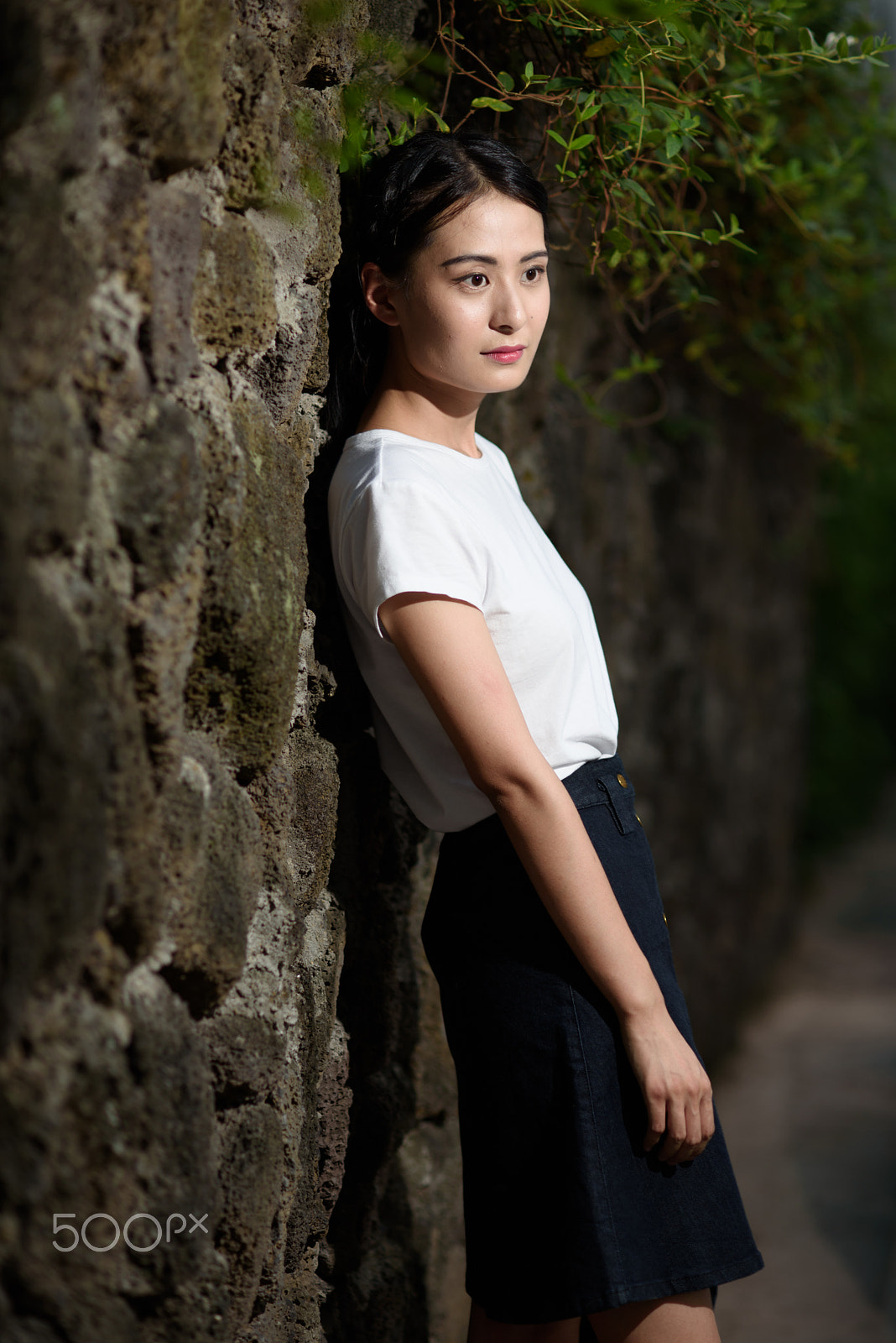 Nikon D750 + Nikon AF Nikkor 105mm F2D DC sample photo. Portrait beside stone wall photography