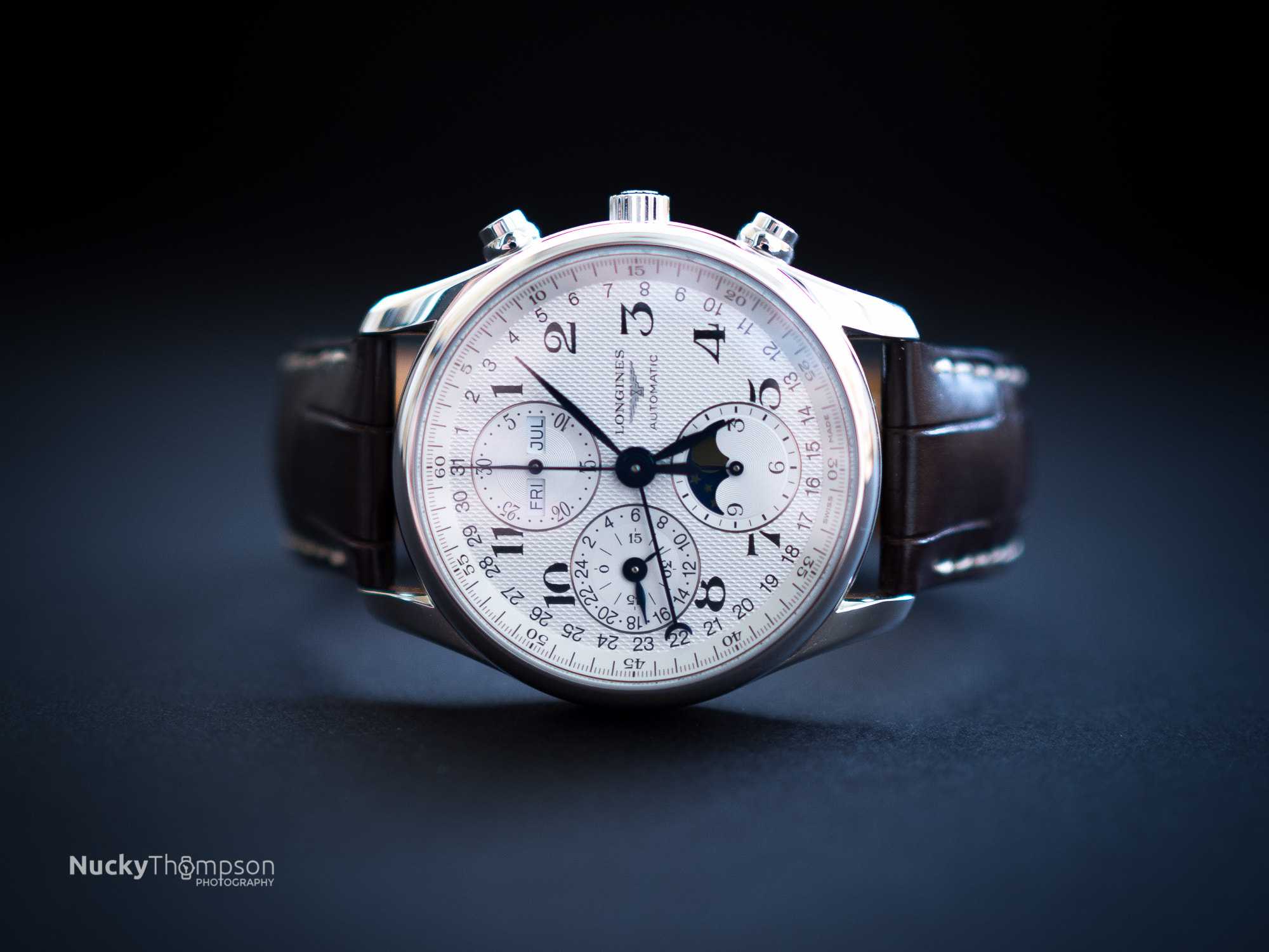 Olympus OM-D E-M10 II + Olympus M.Zuiko Digital 25mm F1.8 sample photo. Longines moonphase chronograph watch photography