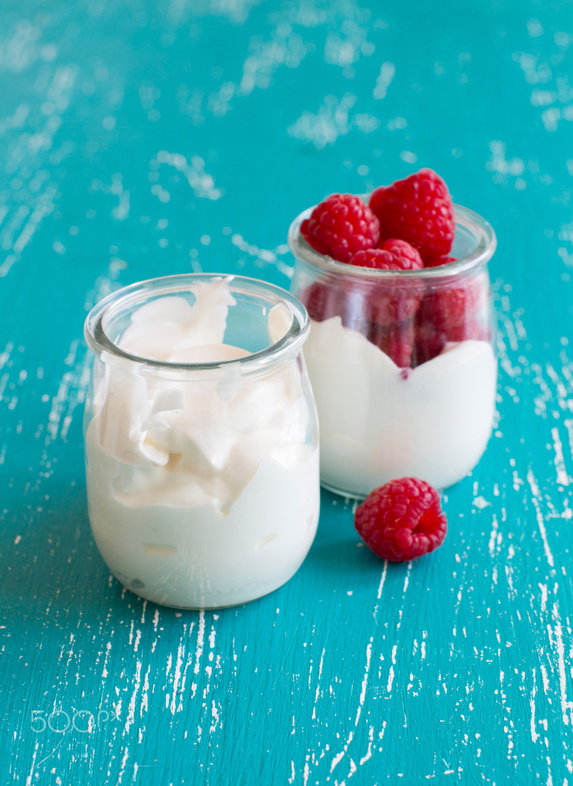 Canon EOS 650D (EOS Rebel T4i / EOS Kiss X6i) + Canon EF 50mm F1.2L USM sample photo. Raspberries and fresh yogurt in a jar photography