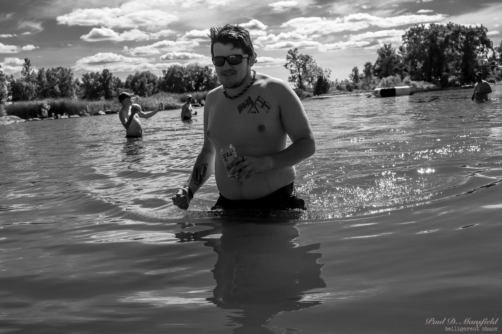 Fujifilm X-A1 + Fujifilm XF 27mm F2.8 sample photo. Swimming and drinking and playing football photography