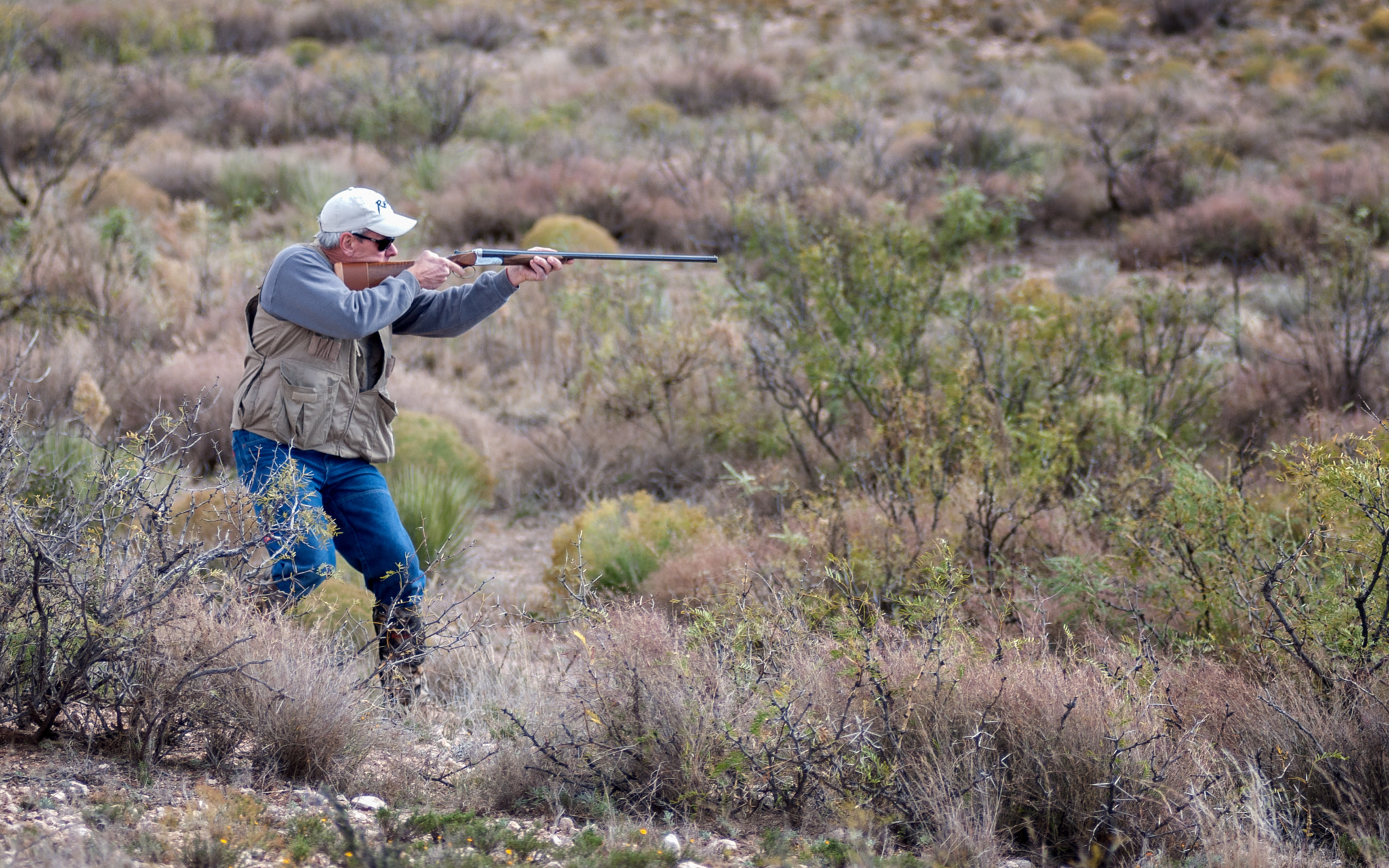 Nikon AF-Nikkor 80-200mm F2.8D ED sample photo. Quail hunting - dad aiming photography