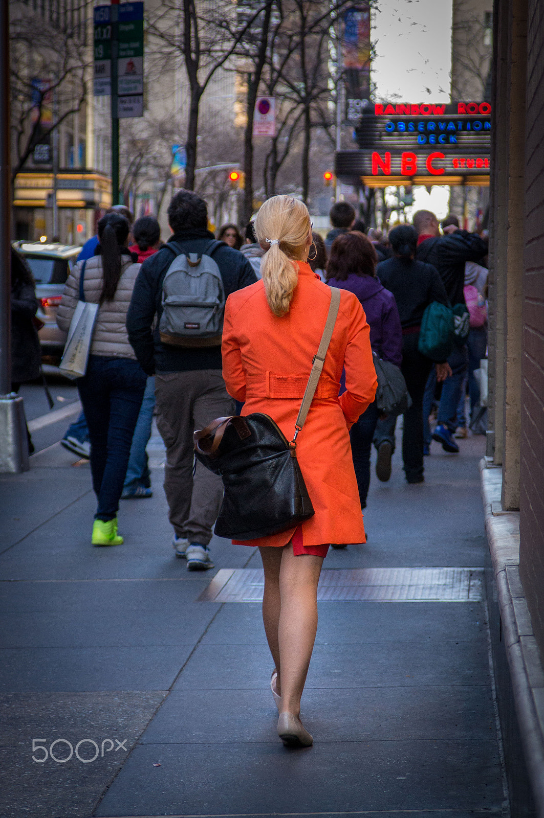 Sony SLT-A55 (SLT-A55V) sample photo. Woman in orange photography