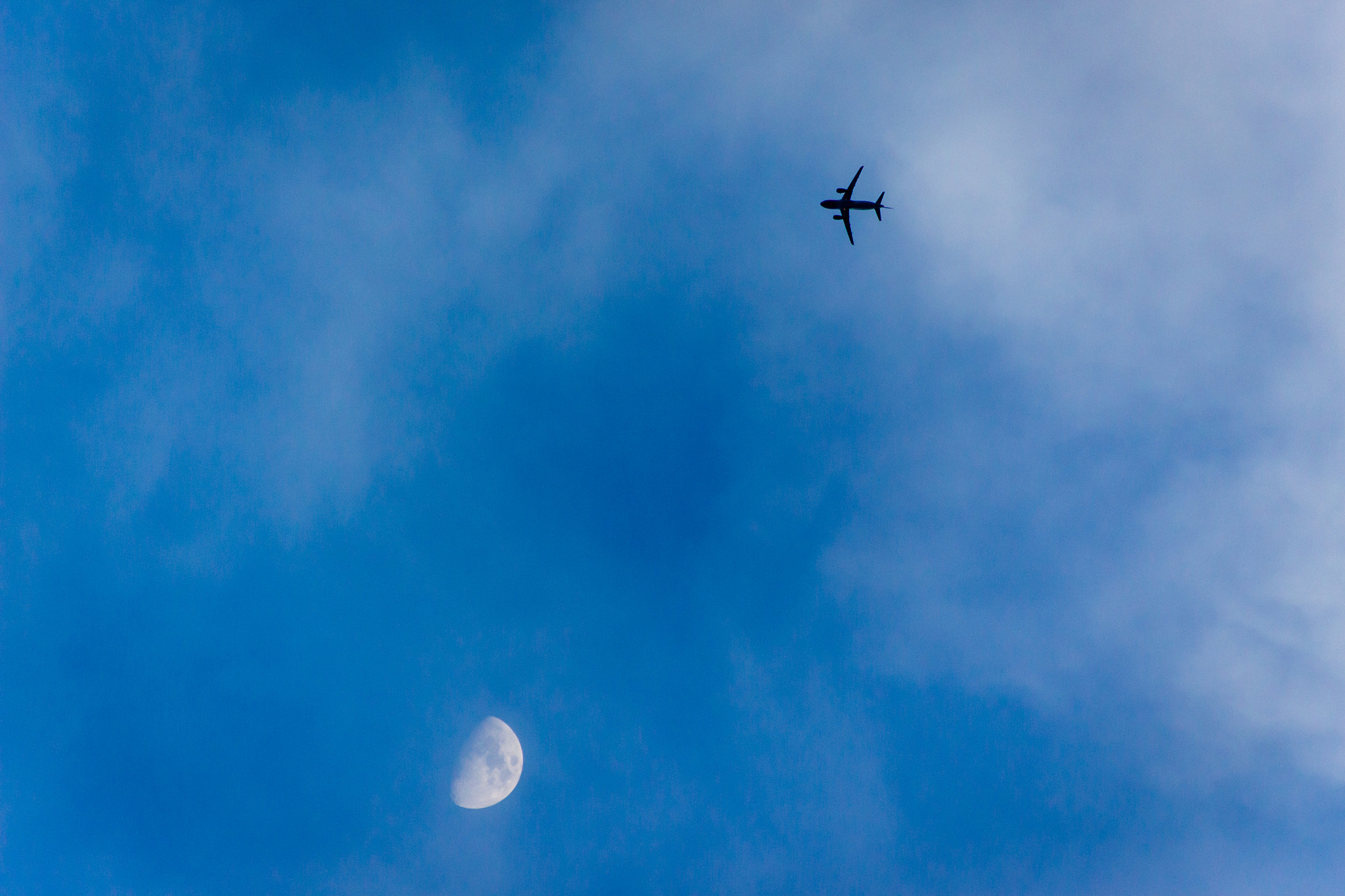 Sigma 55-200mm f/4-5.6 DC sample photo. The plane and the moon photography